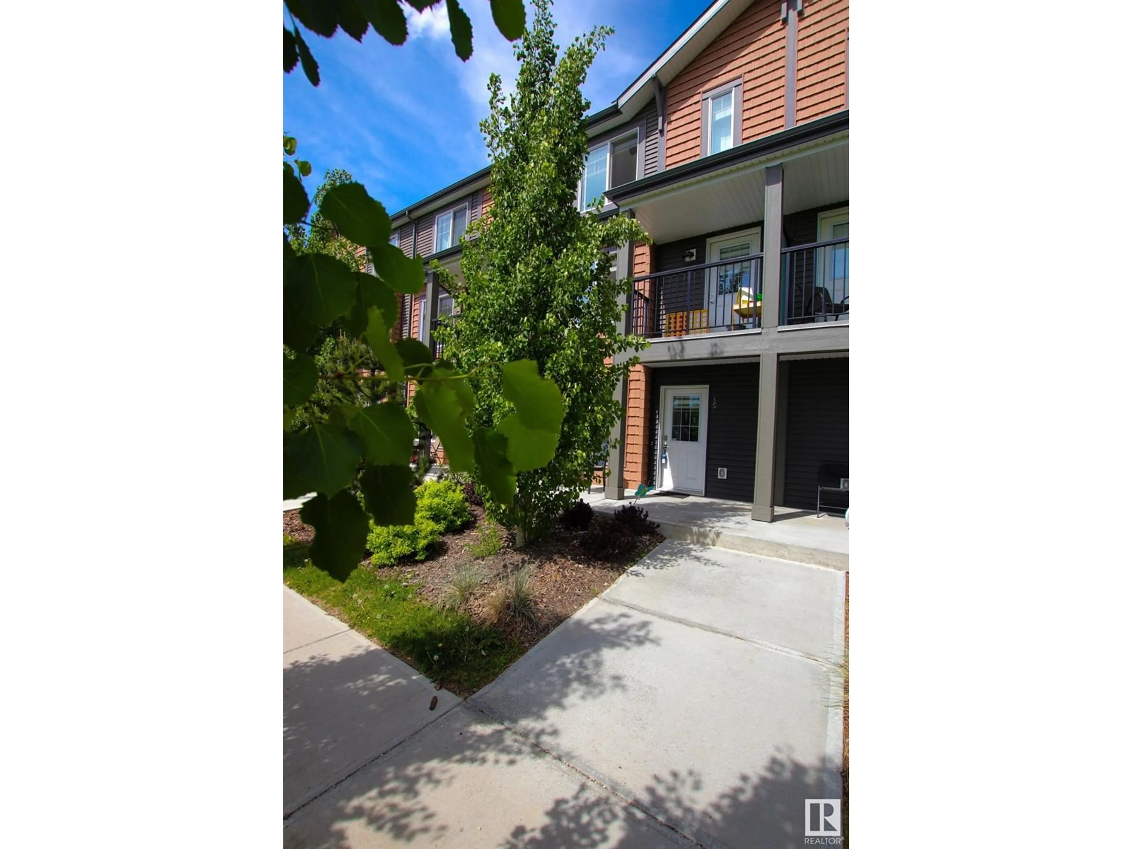 A pic from outside/outdoor area/front of a property/back of a property/a pic from drone, street for 15 - 3025 151 AV, Edmonton Alberta T5Y3W4