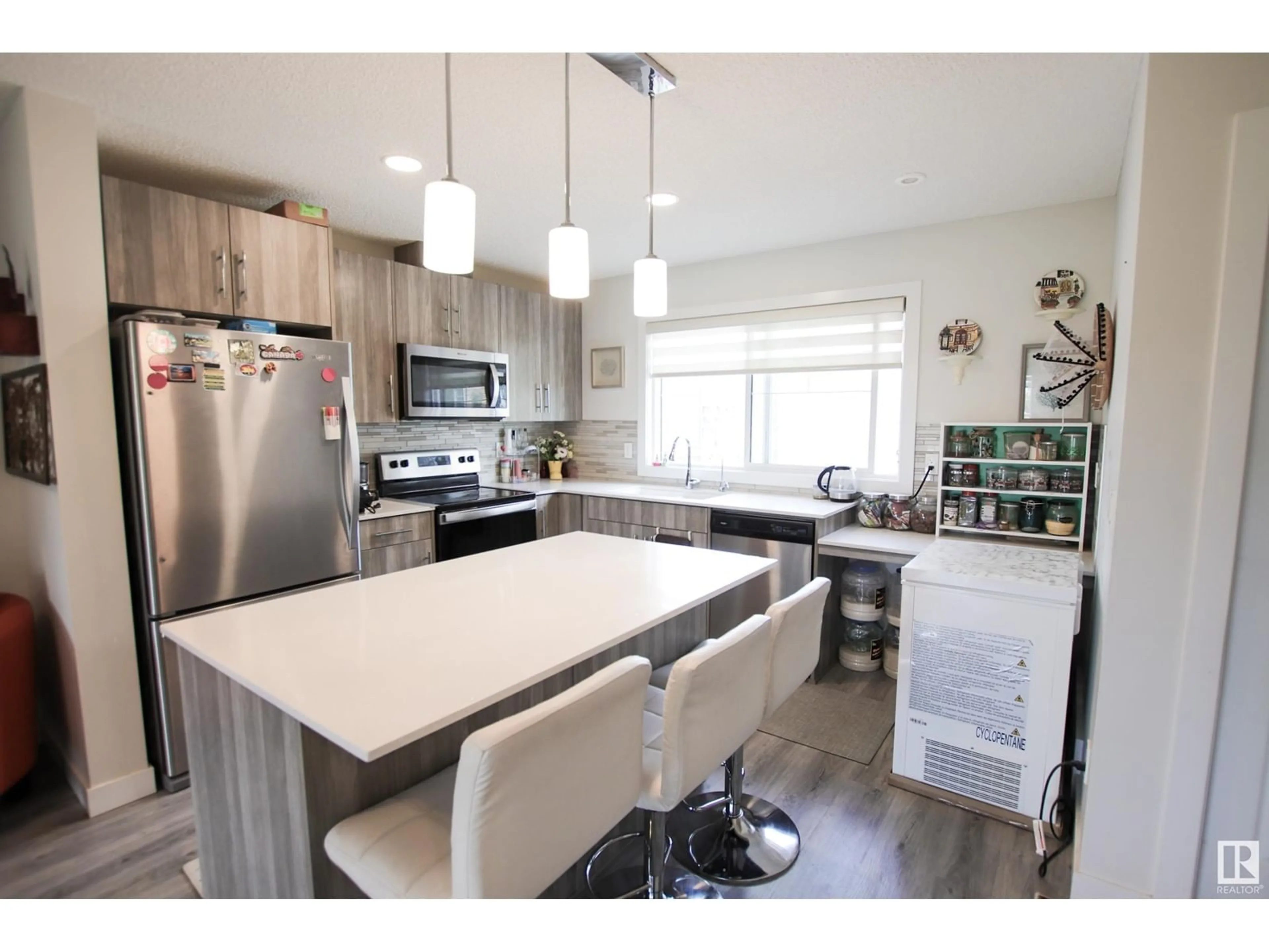Open concept kitchen, unknown for 15 - 3025 151 AV, Edmonton Alberta T5Y3W4