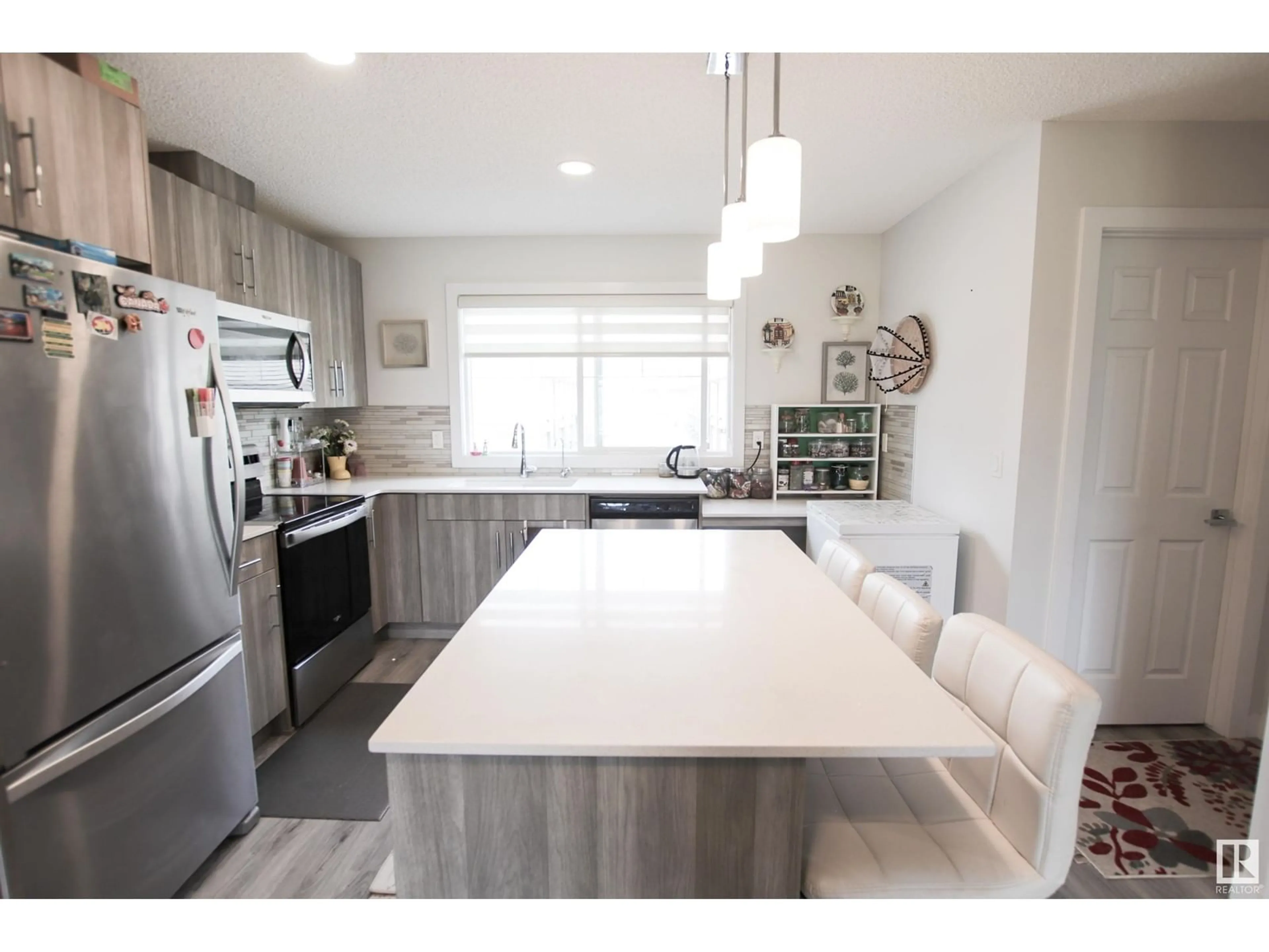 Open concept kitchen, unknown for 15 - 3025 151 AV, Edmonton Alberta T5Y3W4