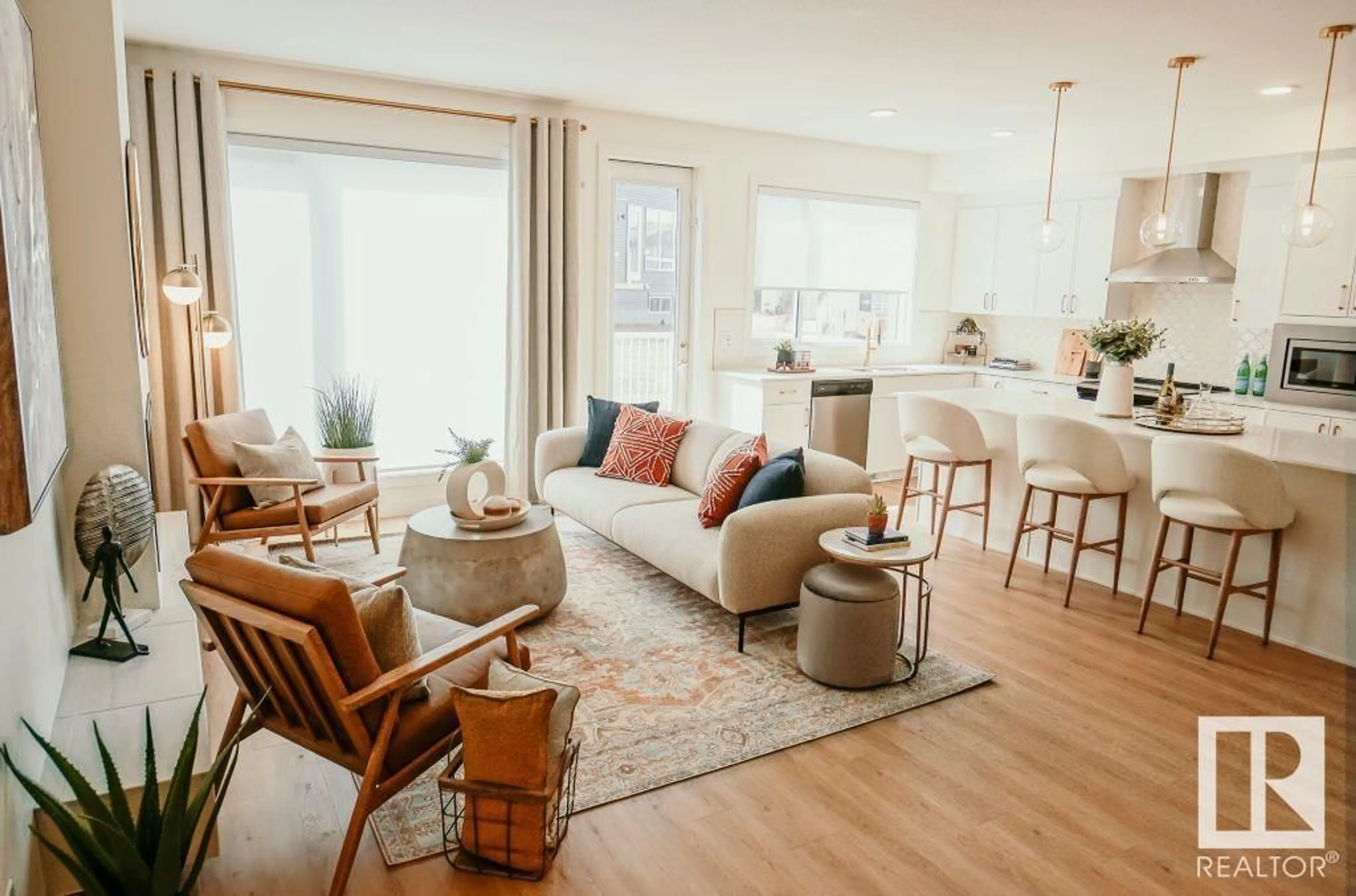 Living room with furniture, wood/laminate floor for 38 RHEA CR, St. Albert Alberta T8N8A4