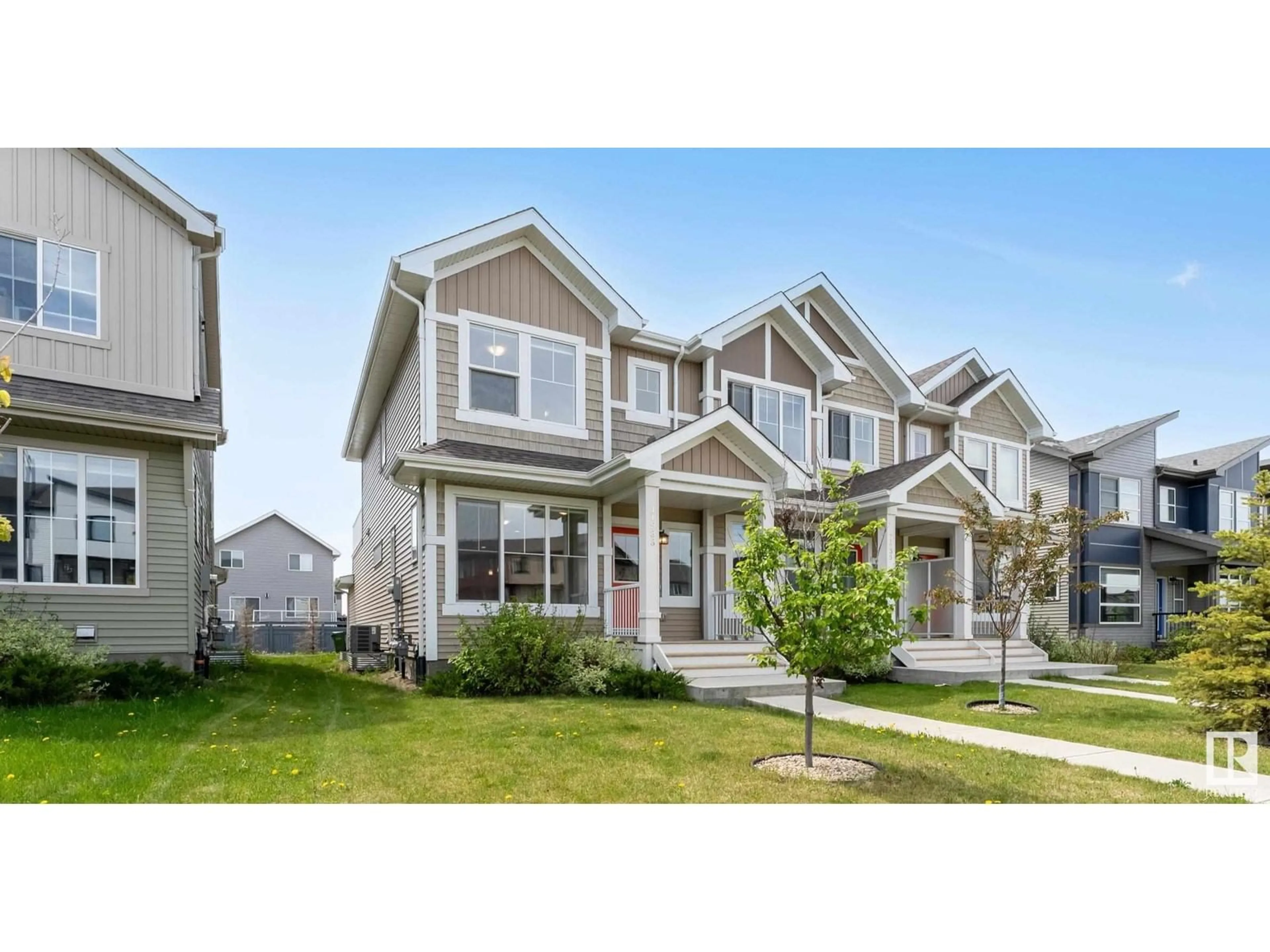 Home with vinyl exterior material, street for SW - 11933 35 AV, Edmonton Alberta T6W4N3