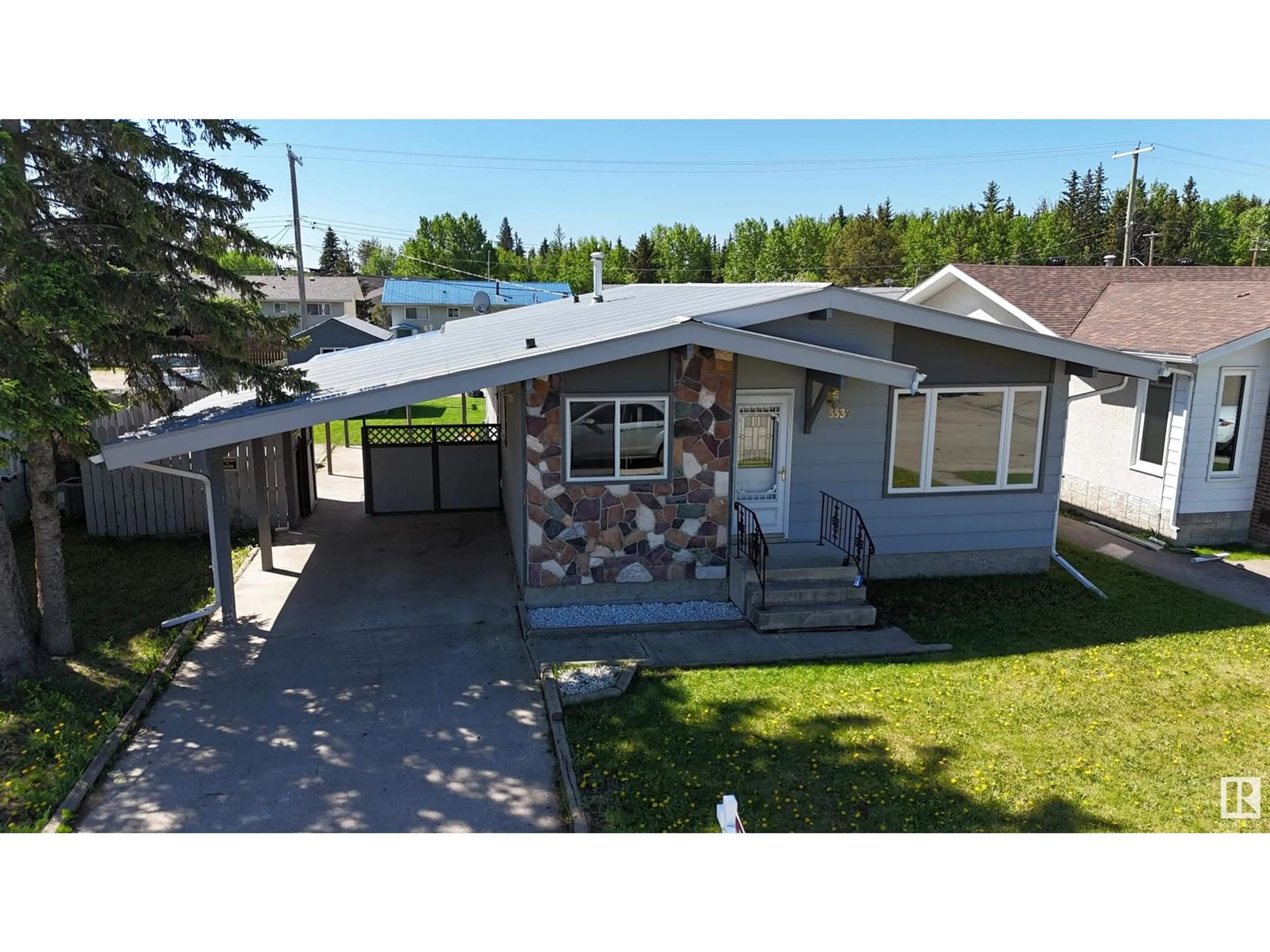 A pic from outside/outdoor area/front of a property/back of a property/a pic from drone, street for 5537 46 AV, Drayton Valley Alberta T7A1K1