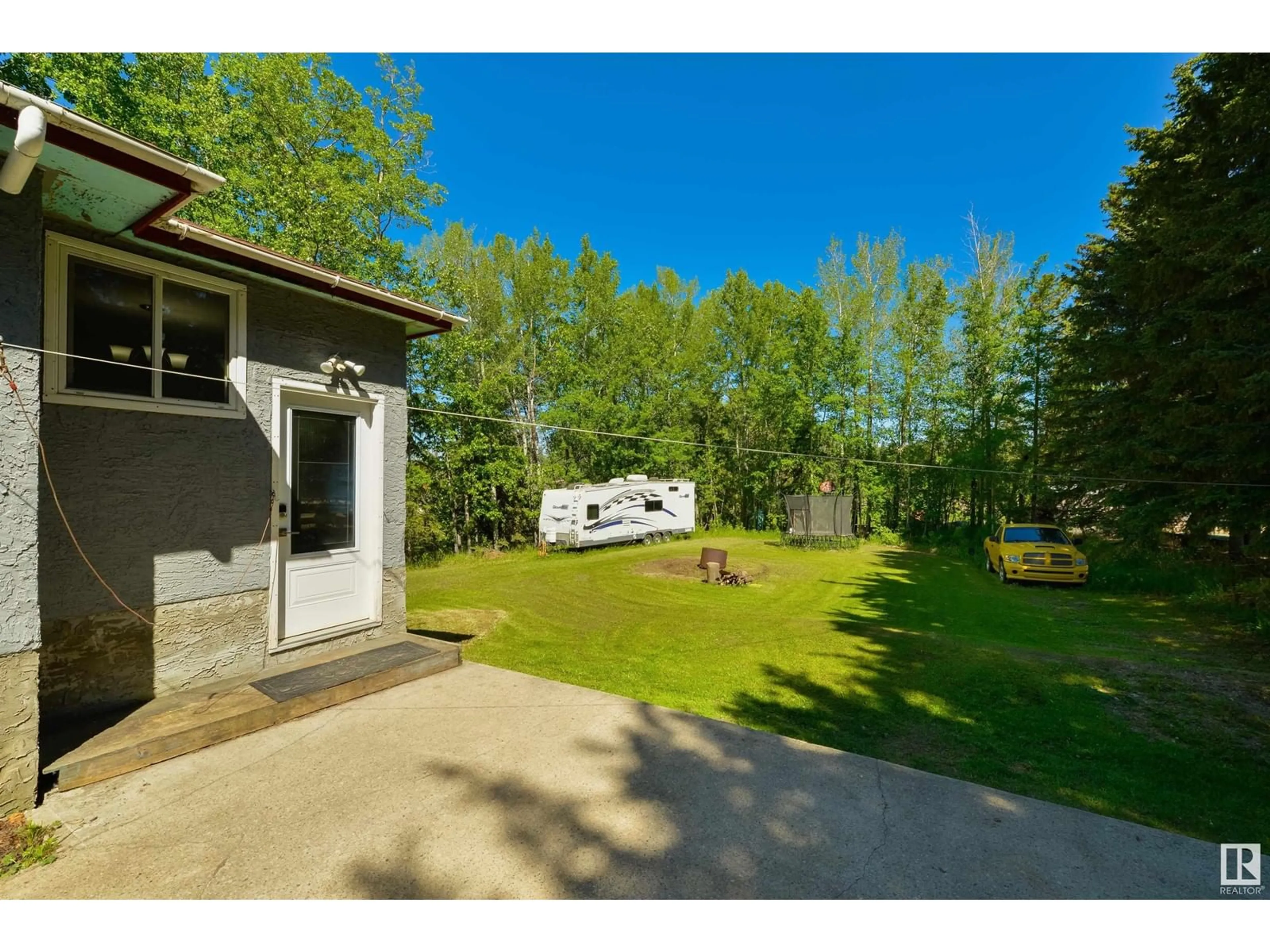 A pic from outside/outdoor area/front of a property/back of a property/a pic from drone, unknown for 6130 HGHWAY 16, Rural Parkland County Alberta T0E0W0