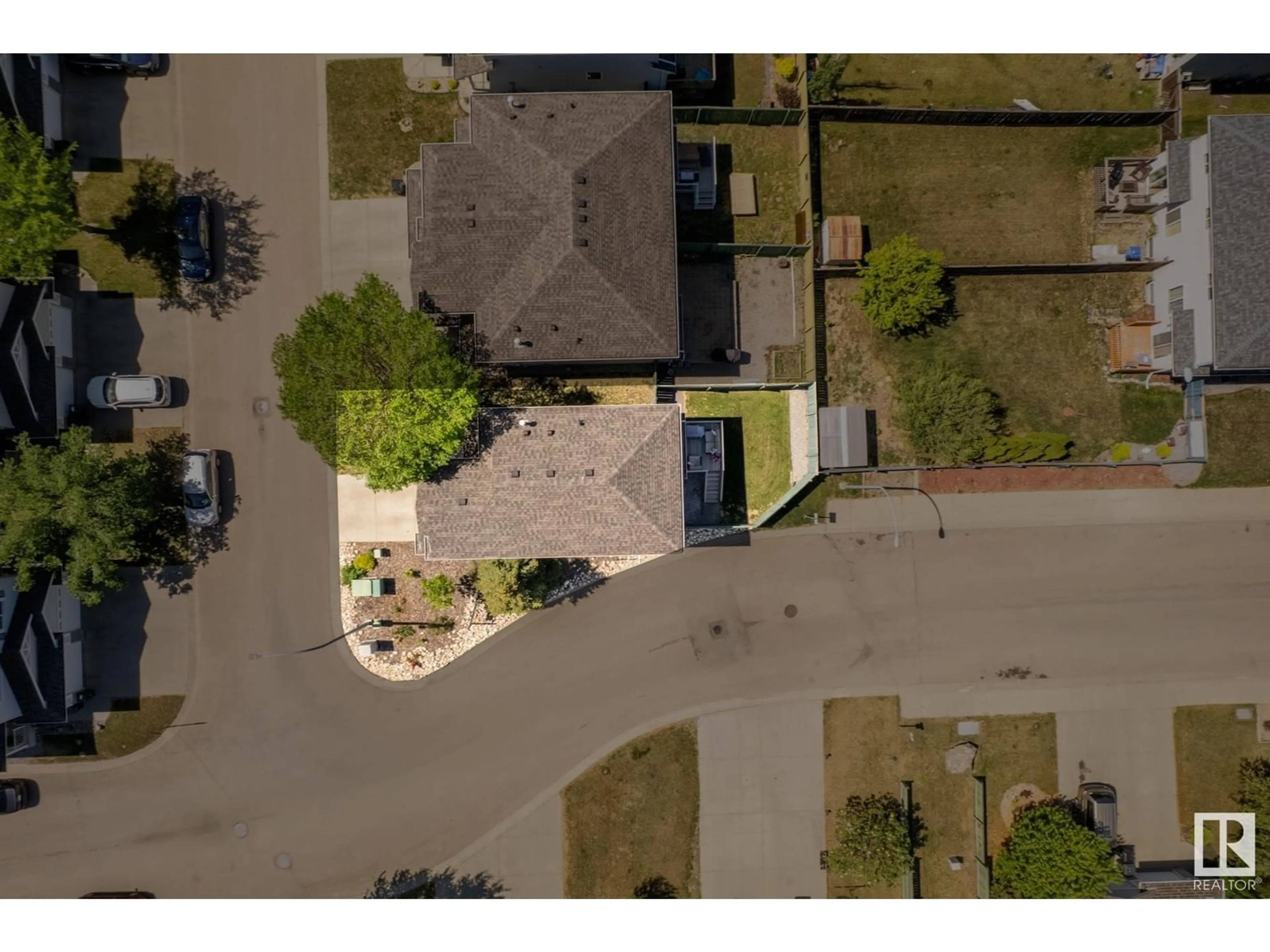 A pic from outside/outdoor area/front of a property/back of a property/a pic from drone, street for 115 - 24 CHESTERMERE DR, Sherwood Park Alberta T8H2W4