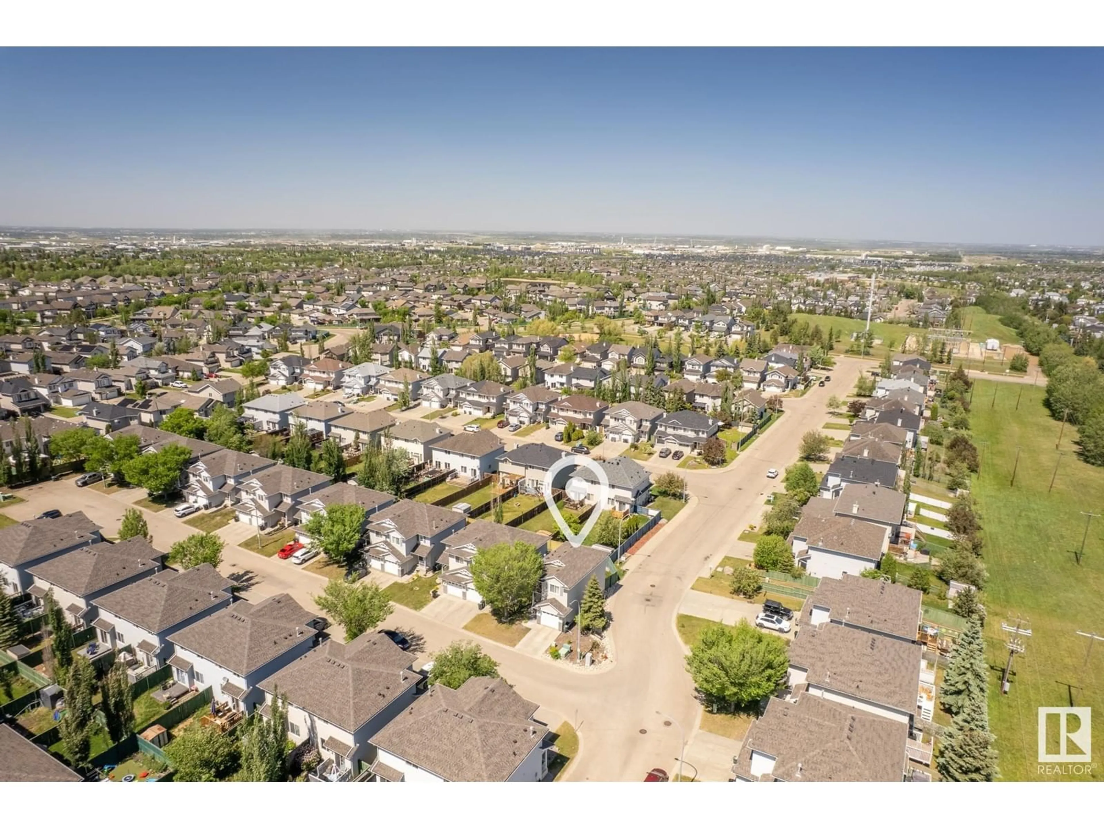 A pic from outside/outdoor area/front of a property/back of a property/a pic from drone, street for 115 - 24 CHESTERMERE DR, Sherwood Park Alberta T8H2W4