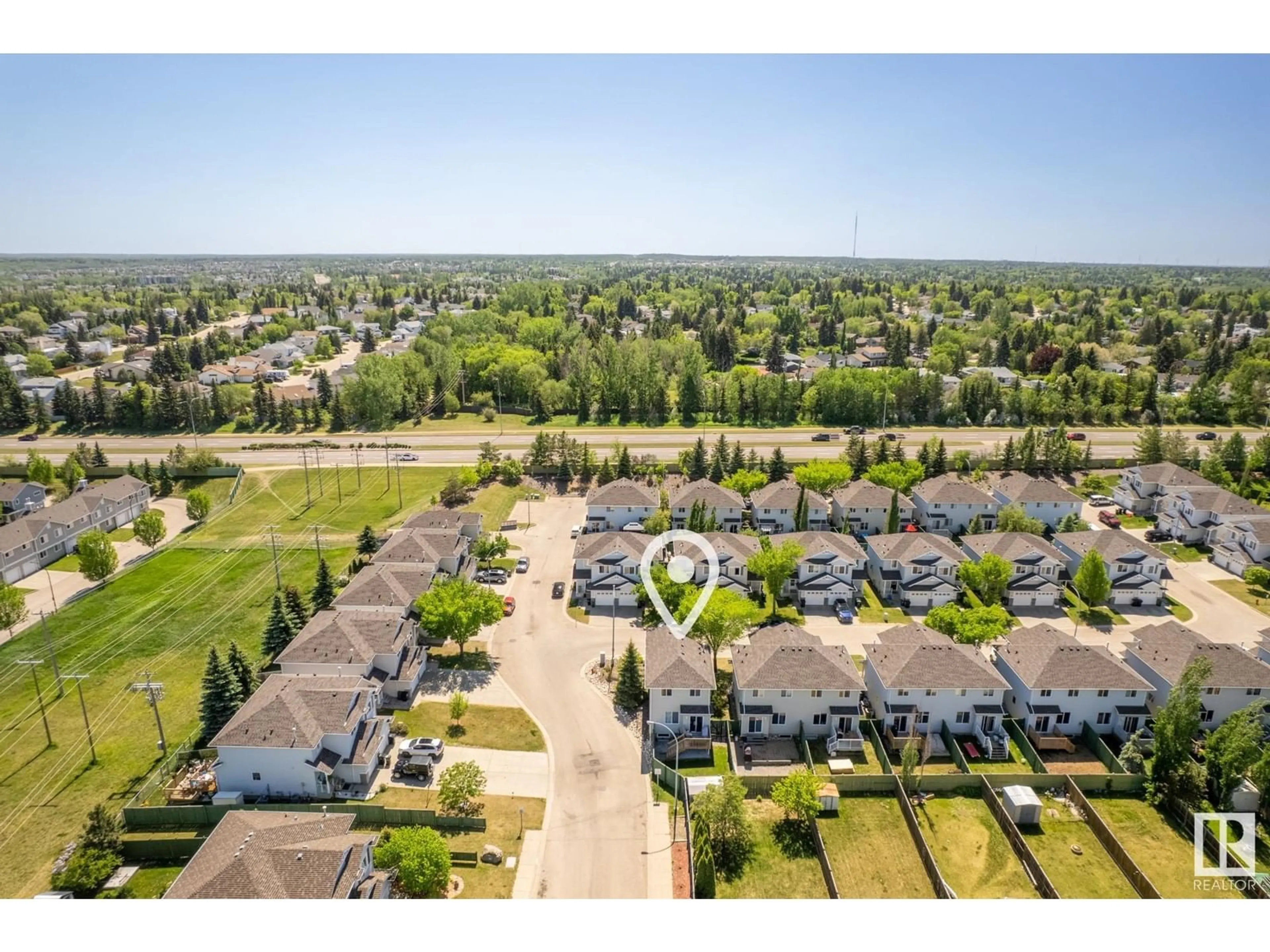 A pic from outside/outdoor area/front of a property/back of a property/a pic from drone, unknown for 115 - 24 CHESTERMERE DR, Sherwood Park Alberta T8H2W4