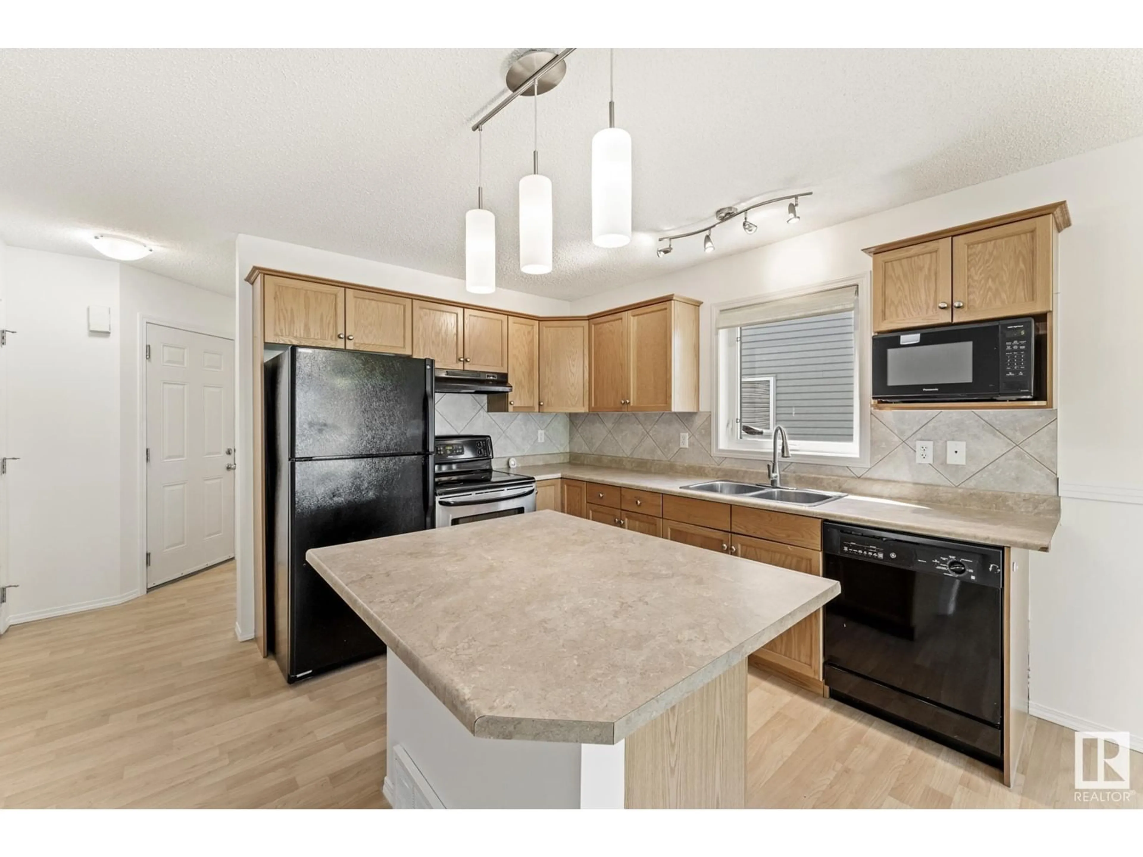 Open concept kitchen, unknown for SW - 6406 1A AV, Edmonton Alberta T6X0B6