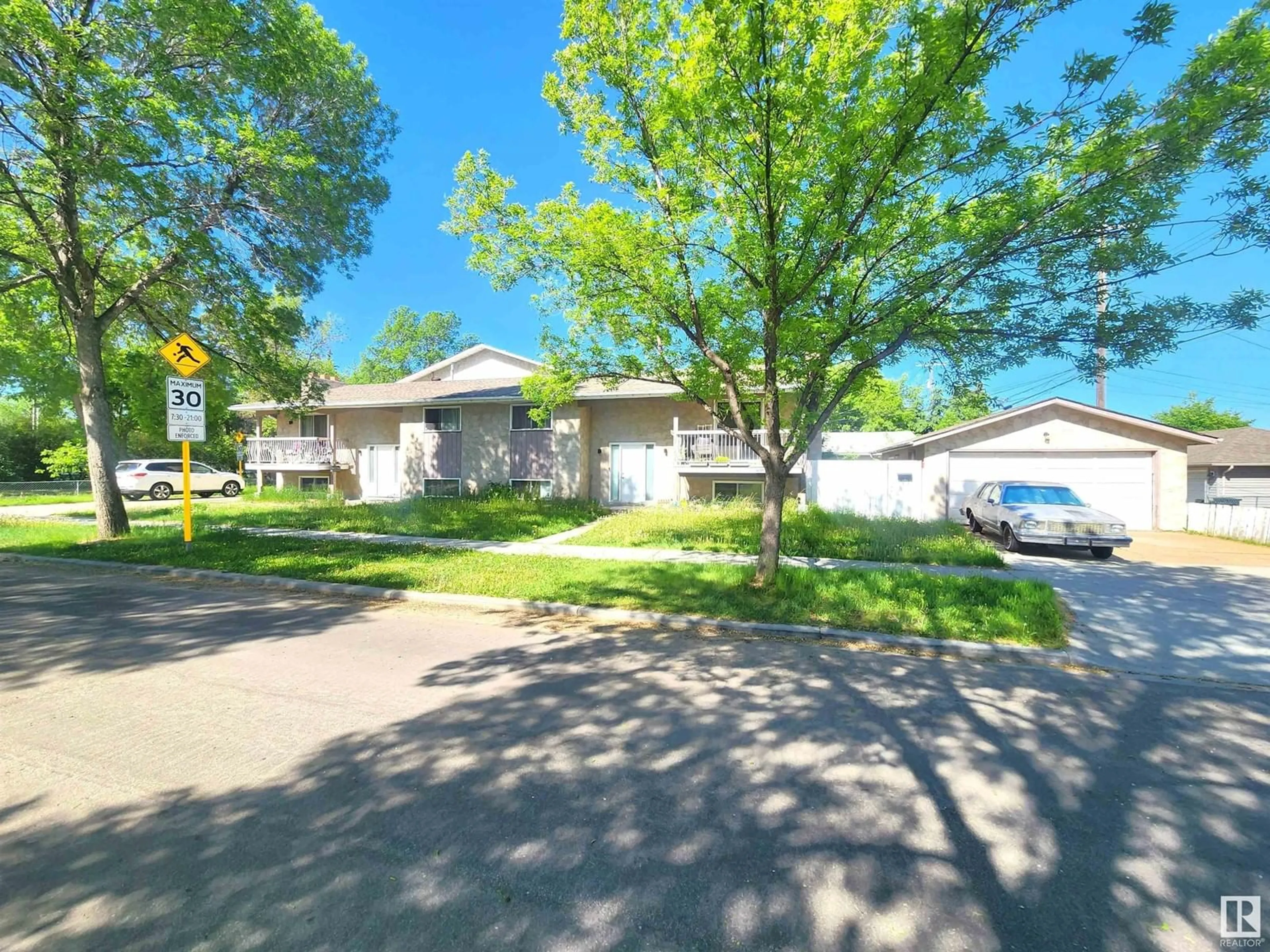 A pic from outside/outdoor area/front of a property/back of a property/a pic from drone, street for NW - 8102 & 8104 81 ST, Edmonton Alberta T6C2V5