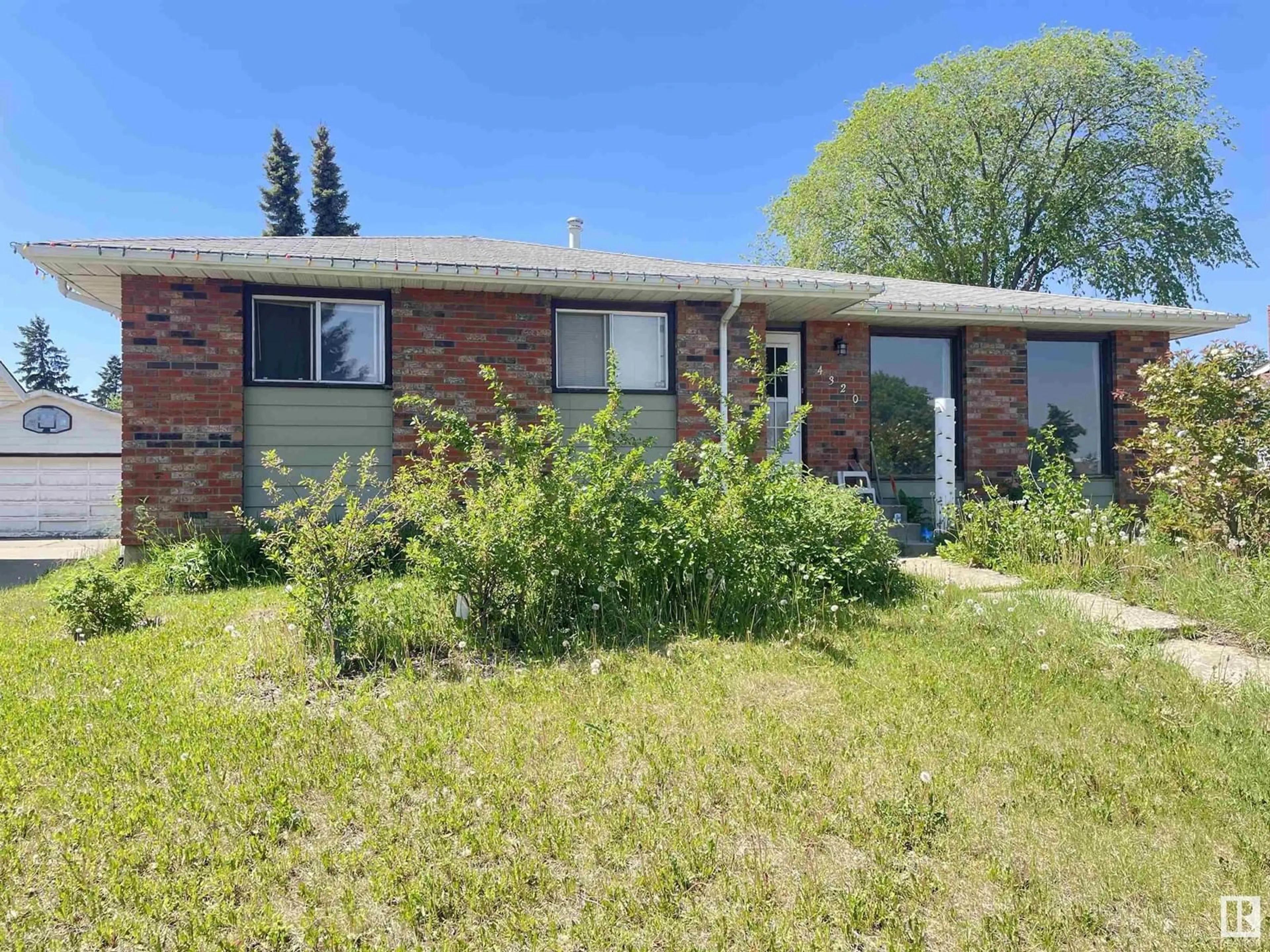 Home with brick exterior material, street for 4320 74 ST, Edmonton Alberta T6K0W2