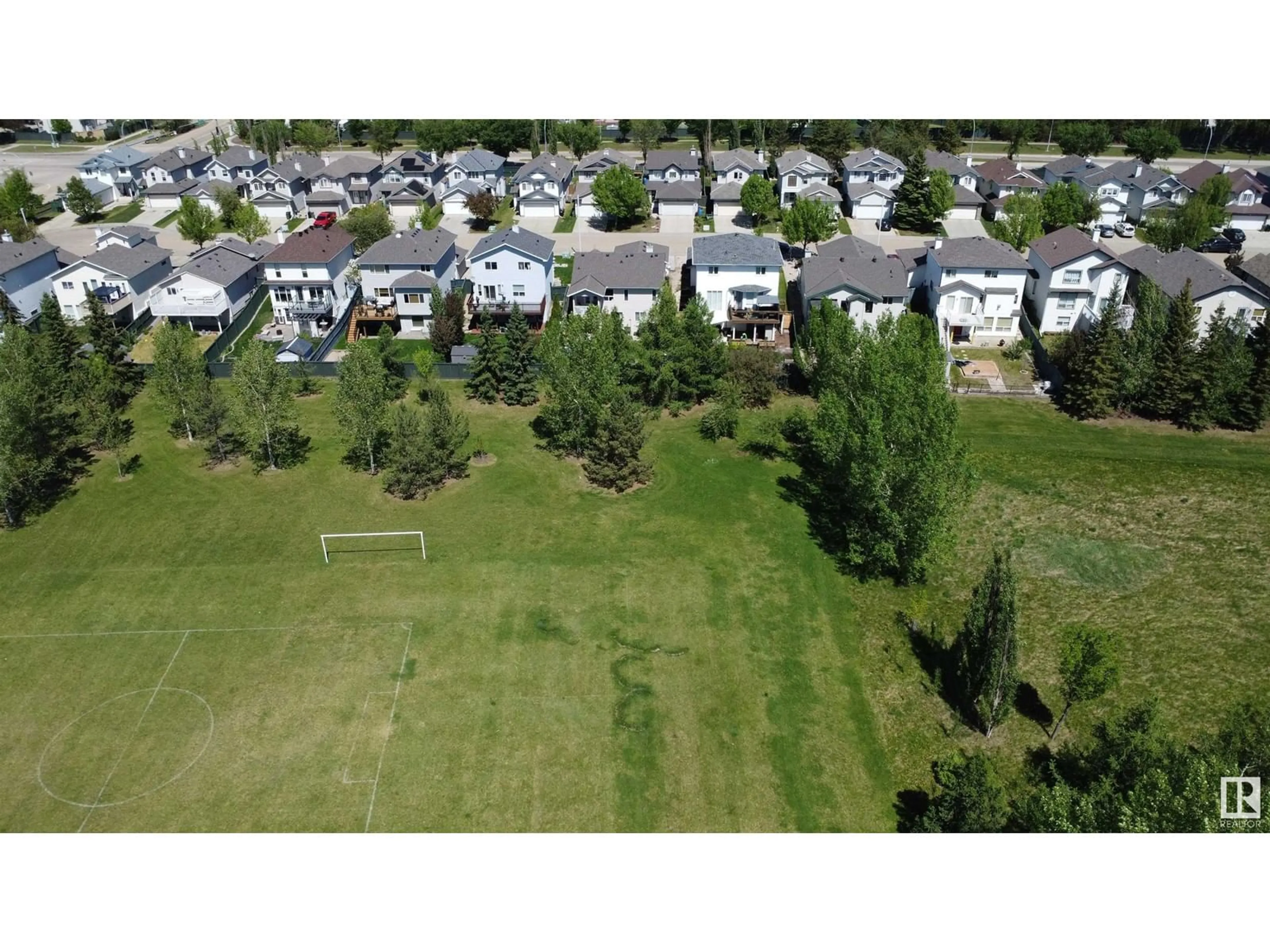 A pic from outside/outdoor area/front of a property/back of a property/a pic from drone, street for NW NW - 1031 GRAHAM CO, Edmonton Alberta T5T6L4