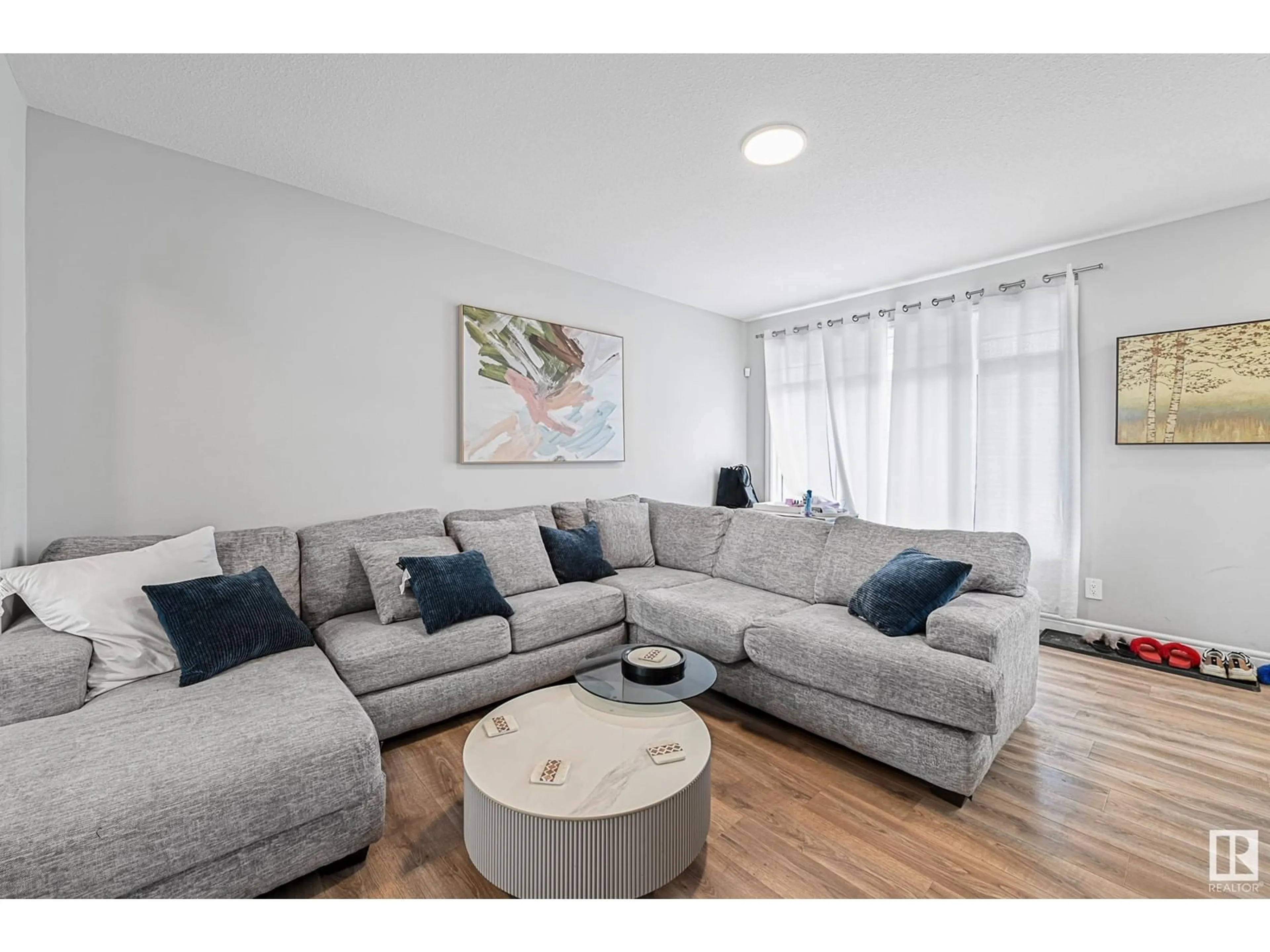 Living room with furniture, unknown for 16703 30 AV, Edmonton Alberta T6W4P9