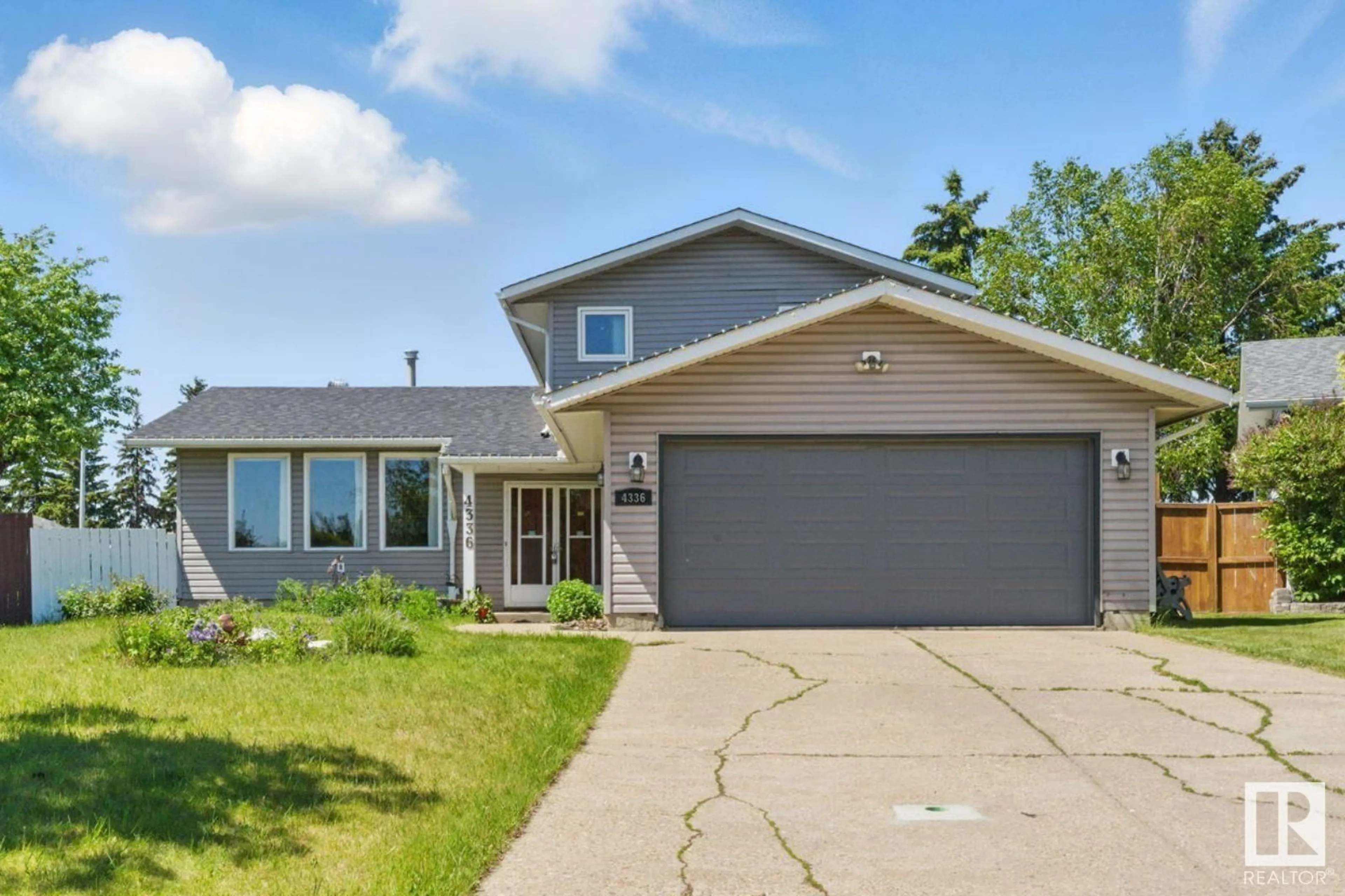 Home with vinyl exterior material, street for 4336 74 ST, Edmonton Alberta T6K0W2