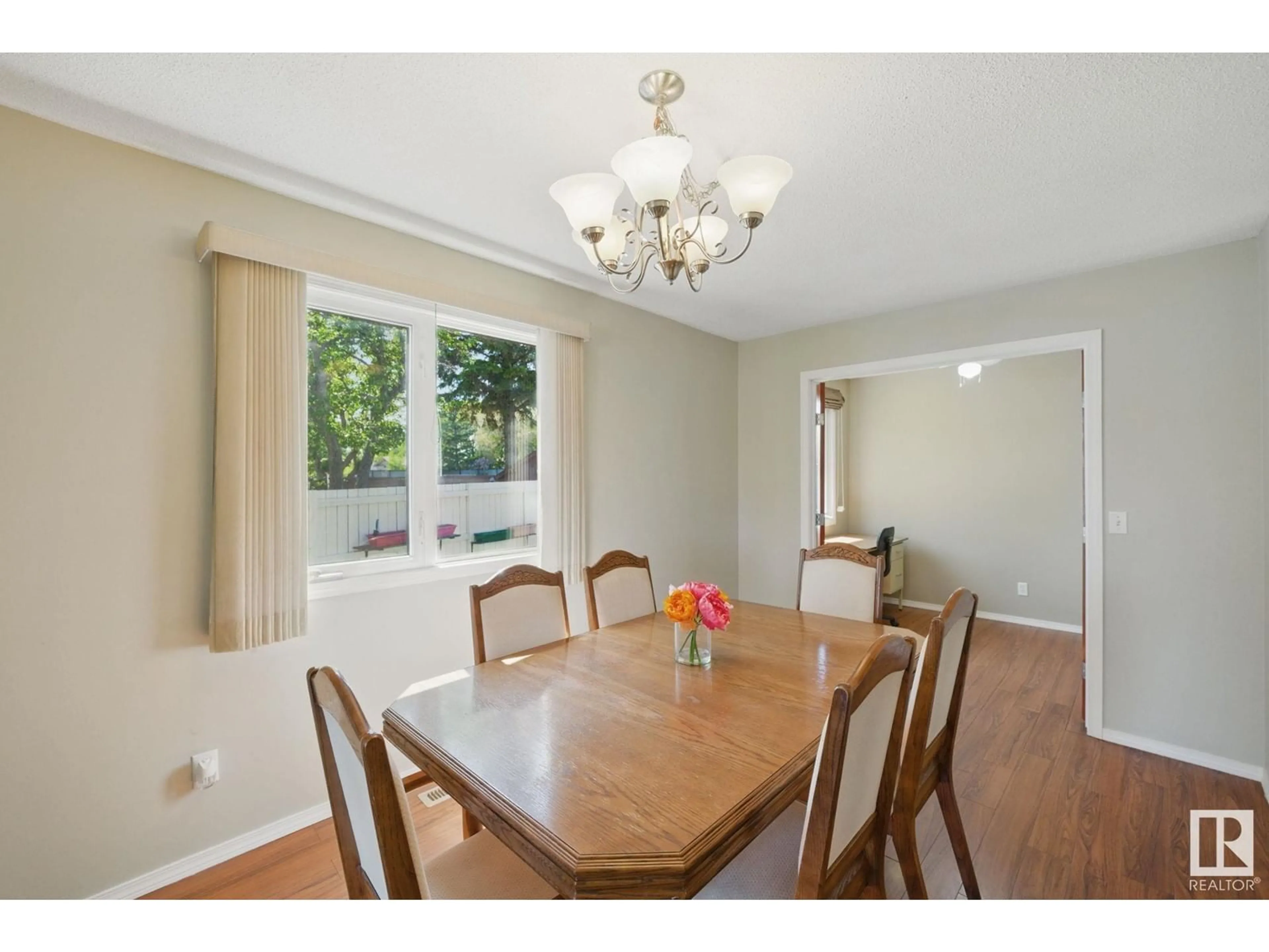 Dining room, wood/laminate floor for 4336 74 ST, Edmonton Alberta T6K0W2