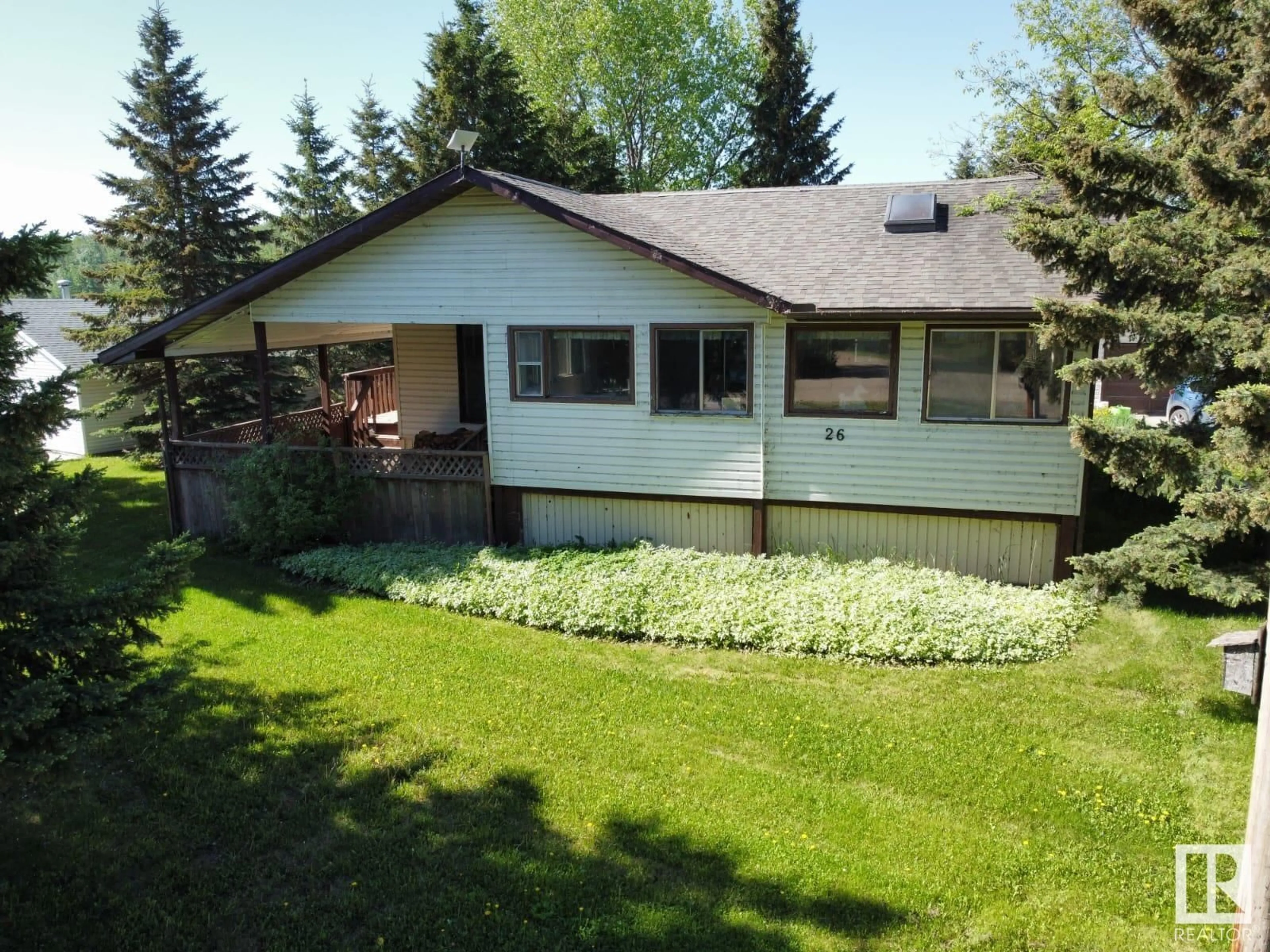 A pic from outside/outdoor area/front of a property/back of a property/a pic from drone, street for 26 LAKESHORE DR, Rural Wetaskiwin County Alberta T0C2V0