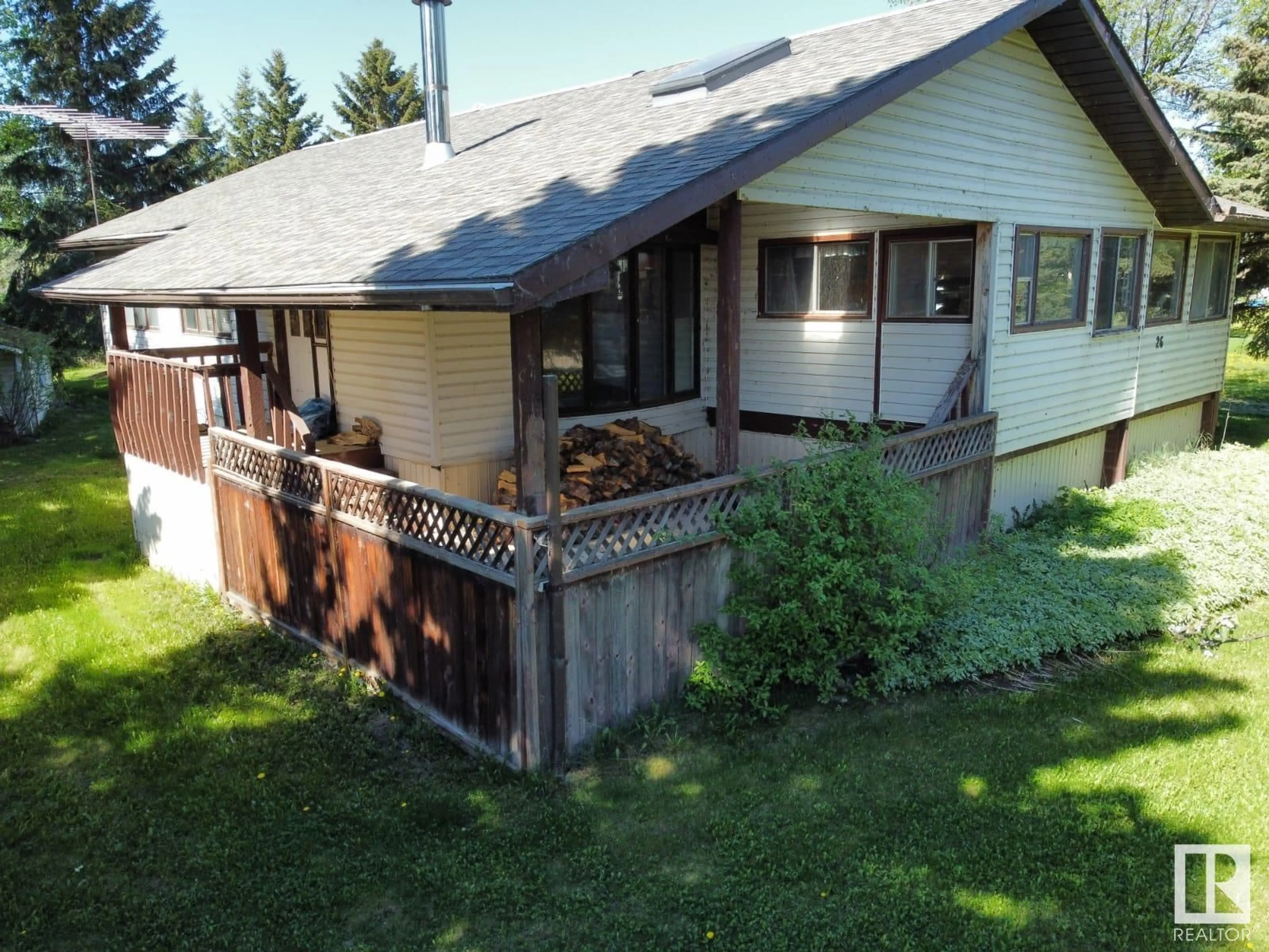 A pic from outside/outdoor area/front of a property/back of a property/a pic from drone, unknown for 26 LAKESHORE DR, Rural Wetaskiwin County Alberta T0C2V0