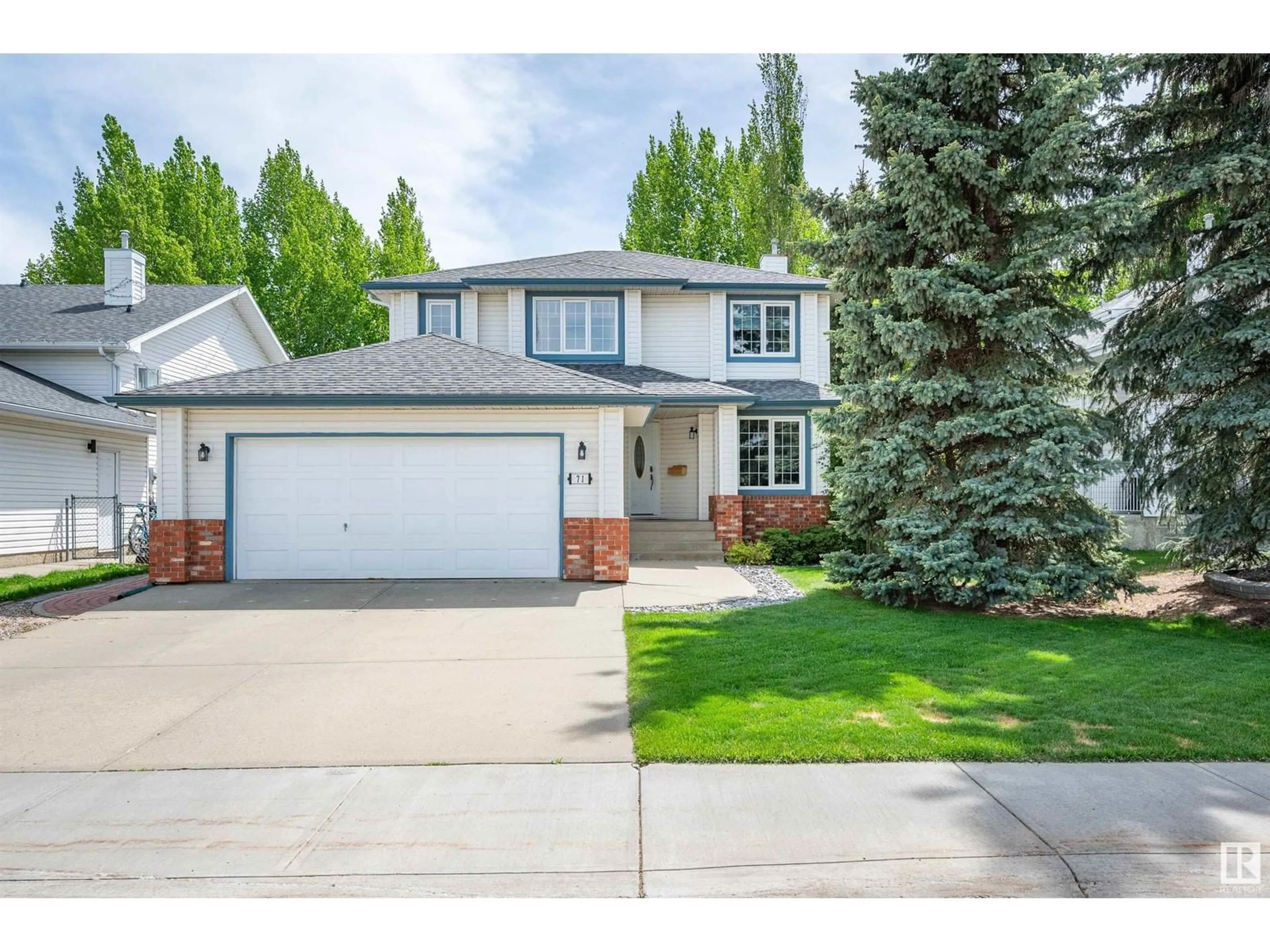 Home with vinyl exterior material, street for 71 CALICO DR, Sherwood Park Alberta T8A5P3