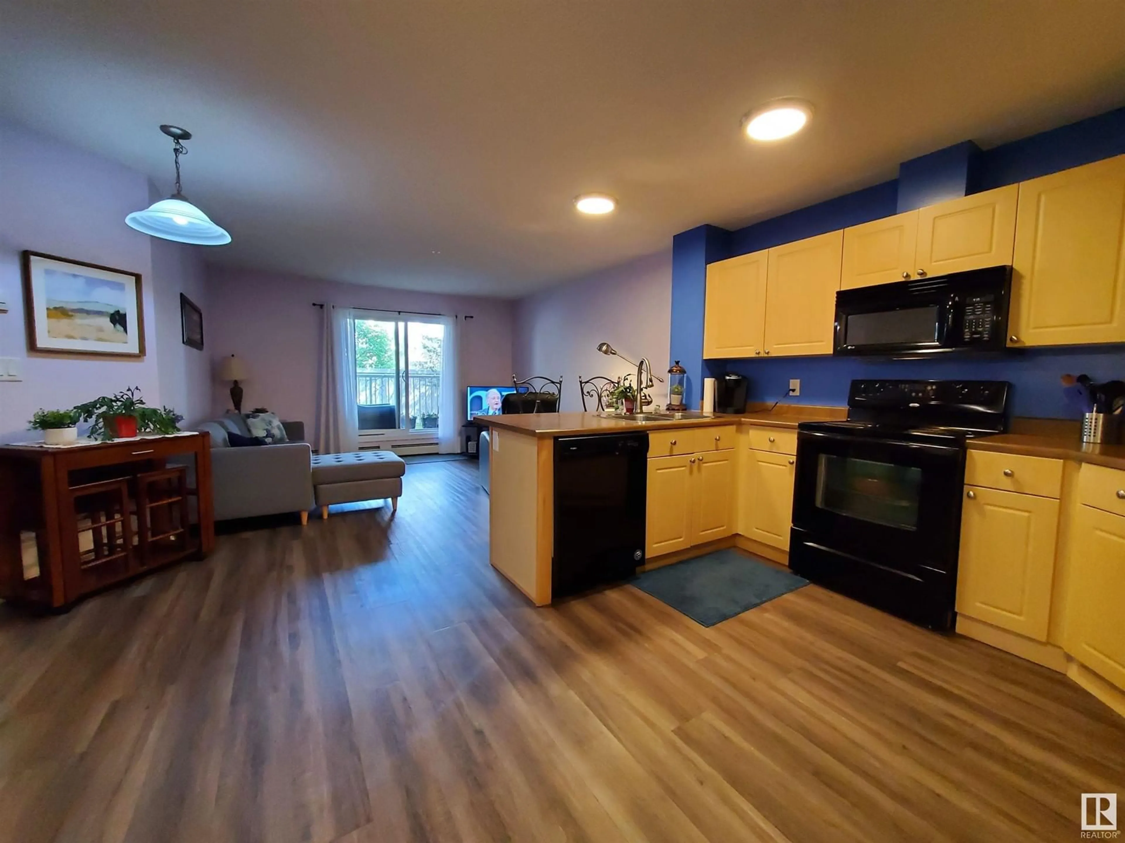 Open concept kitchen, unknown for #109 - 4403 23 ST, Edmonton Alberta T6T1E4