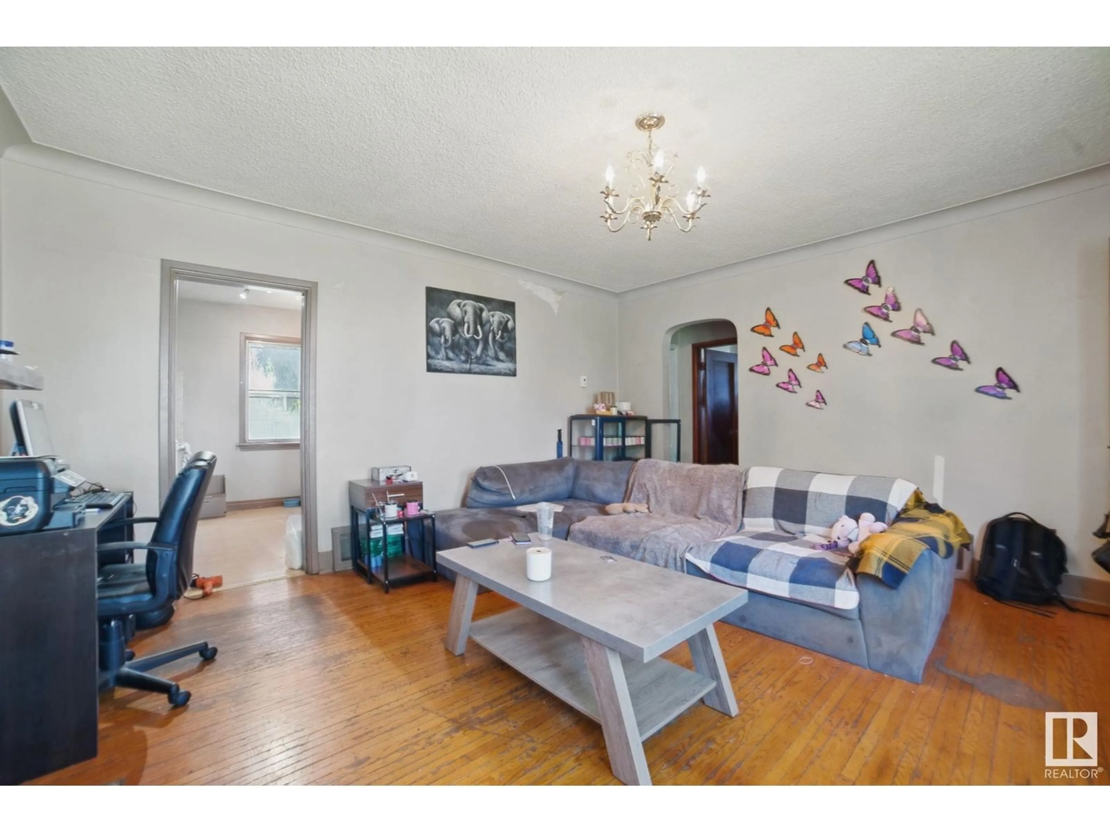 Living room with furniture, unknown for NW - 11408 101 ST, Edmonton Alberta T5G2A8