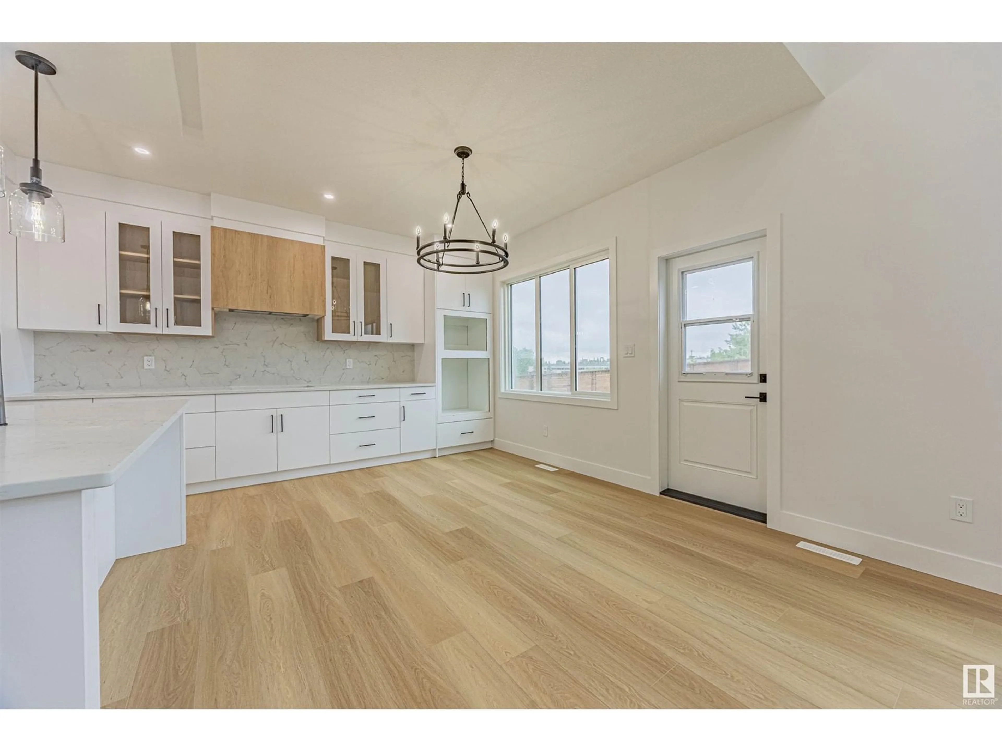 Open concept kitchen, wood/laminate floor for 17 BIRKSHIRE CR, Sherwood Park Alberta T8B0C6
