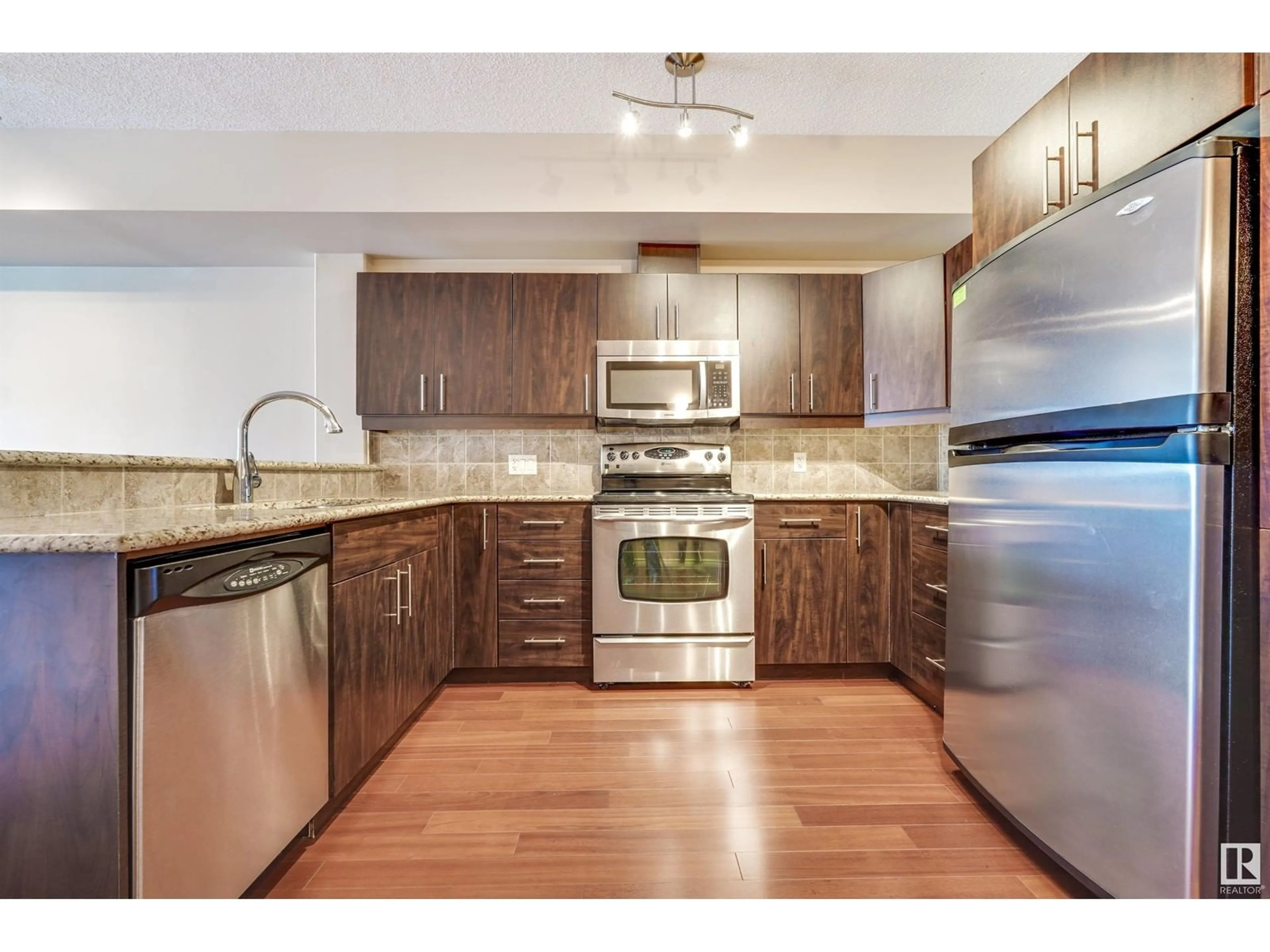 Standard kitchen, wood/laminate floor for 10303 - 508 111 ST NW, Edmonton Alberta T5K0C6