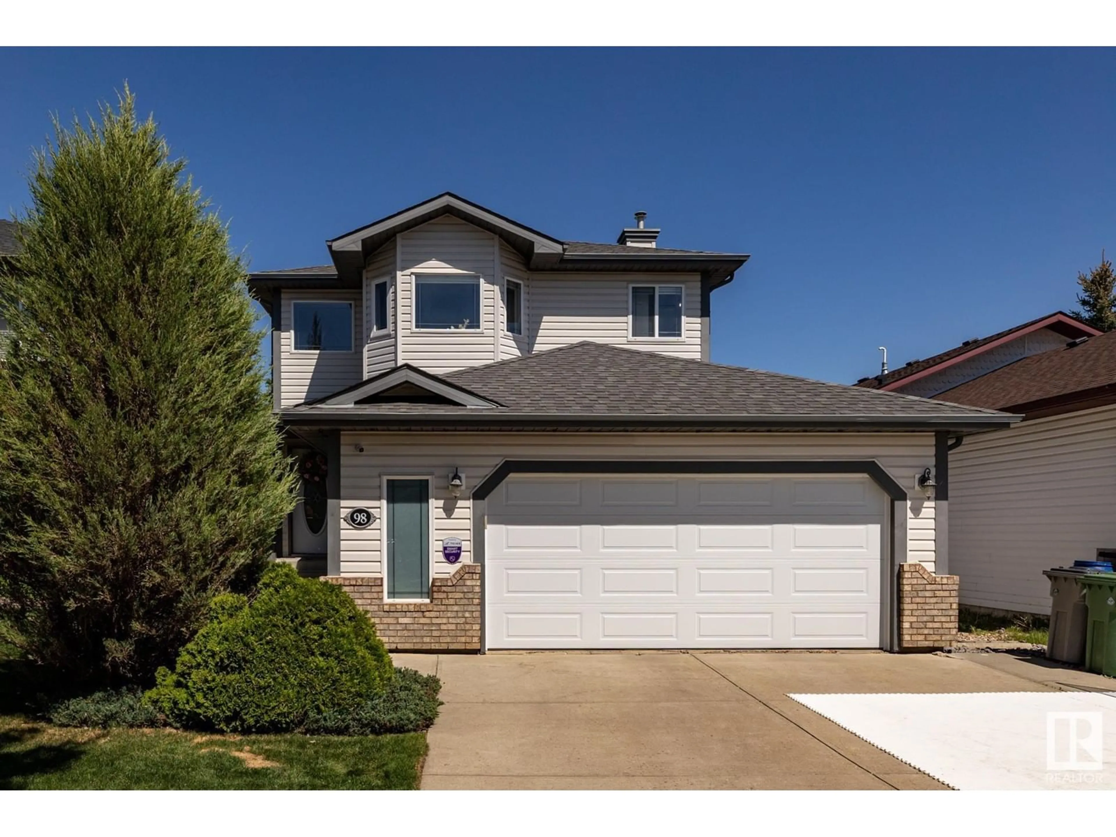 Home with vinyl exterior material, street for 98 BONIN CR, Beaumont Alberta T4X1N7
