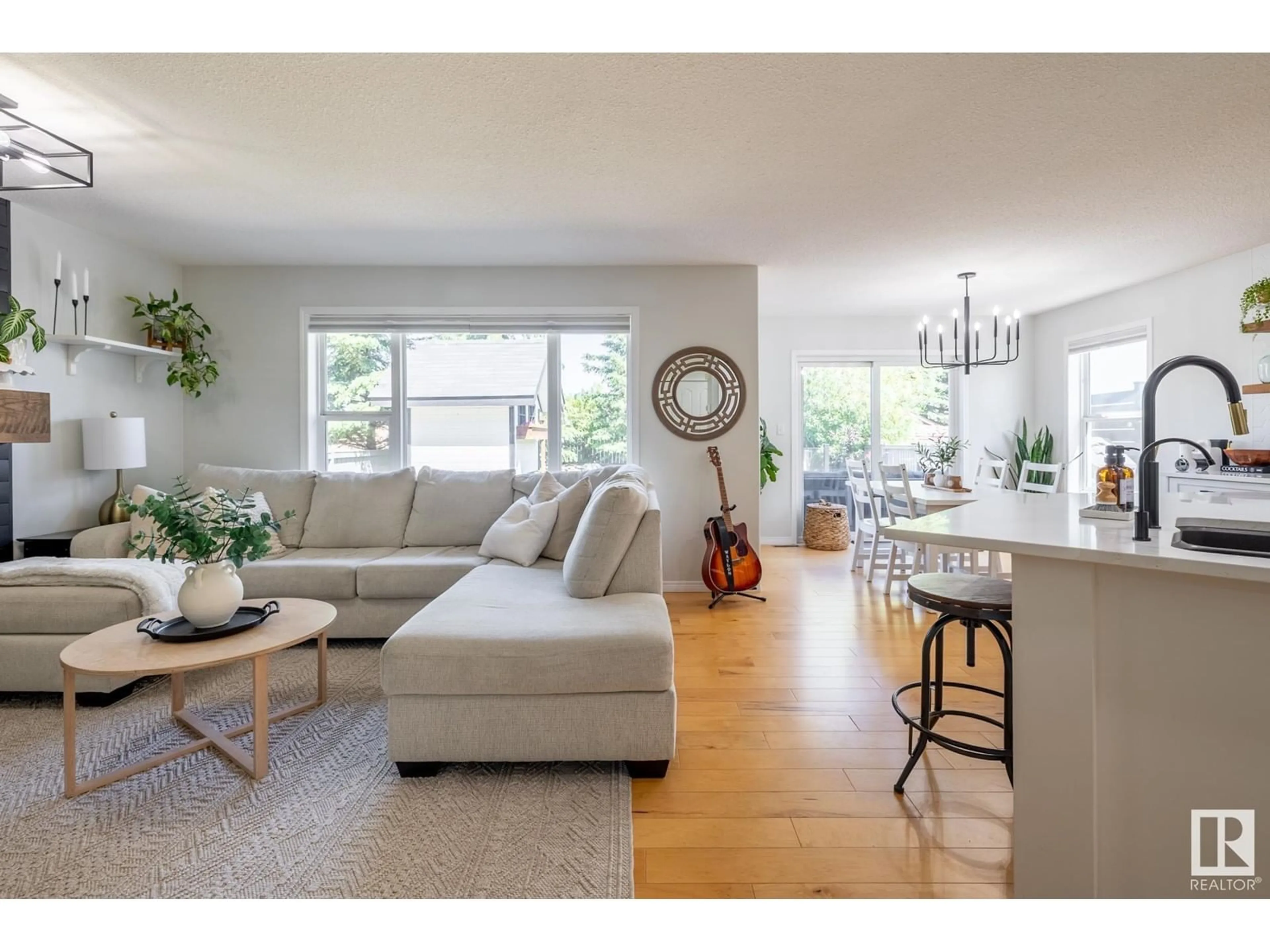 Living room with furniture, wood/laminate floor for 98 BONIN CR, Beaumont Alberta T4X1N7