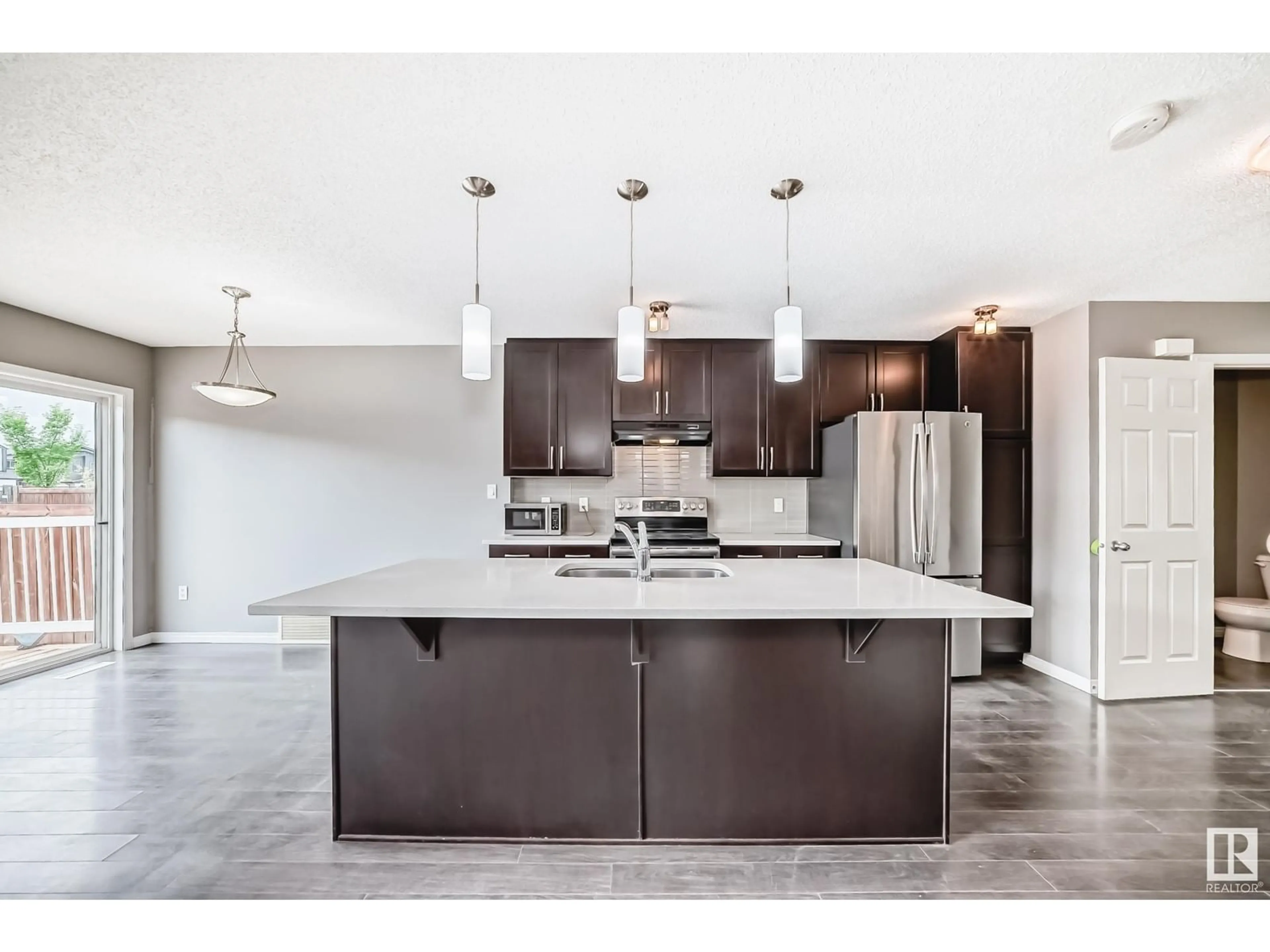 Open concept kitchen, ceramic/tile floor for LI SW - 5181 CRABAPPLE LINK, Edmonton Alberta T6X1X1