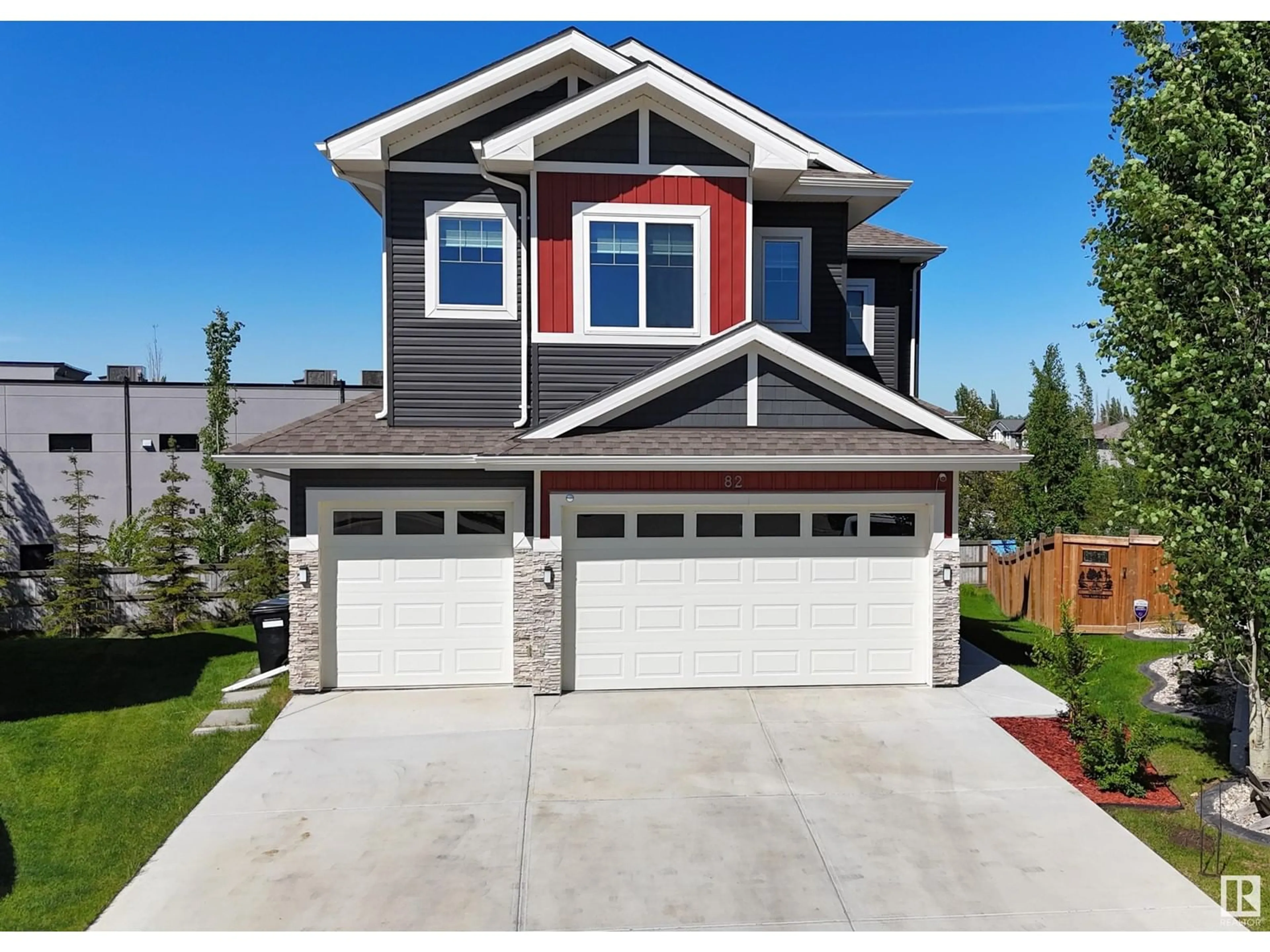 Home with vinyl exterior material, street for 82 MEADOWLAND WY, Spruce Grove Alberta T7X0S4