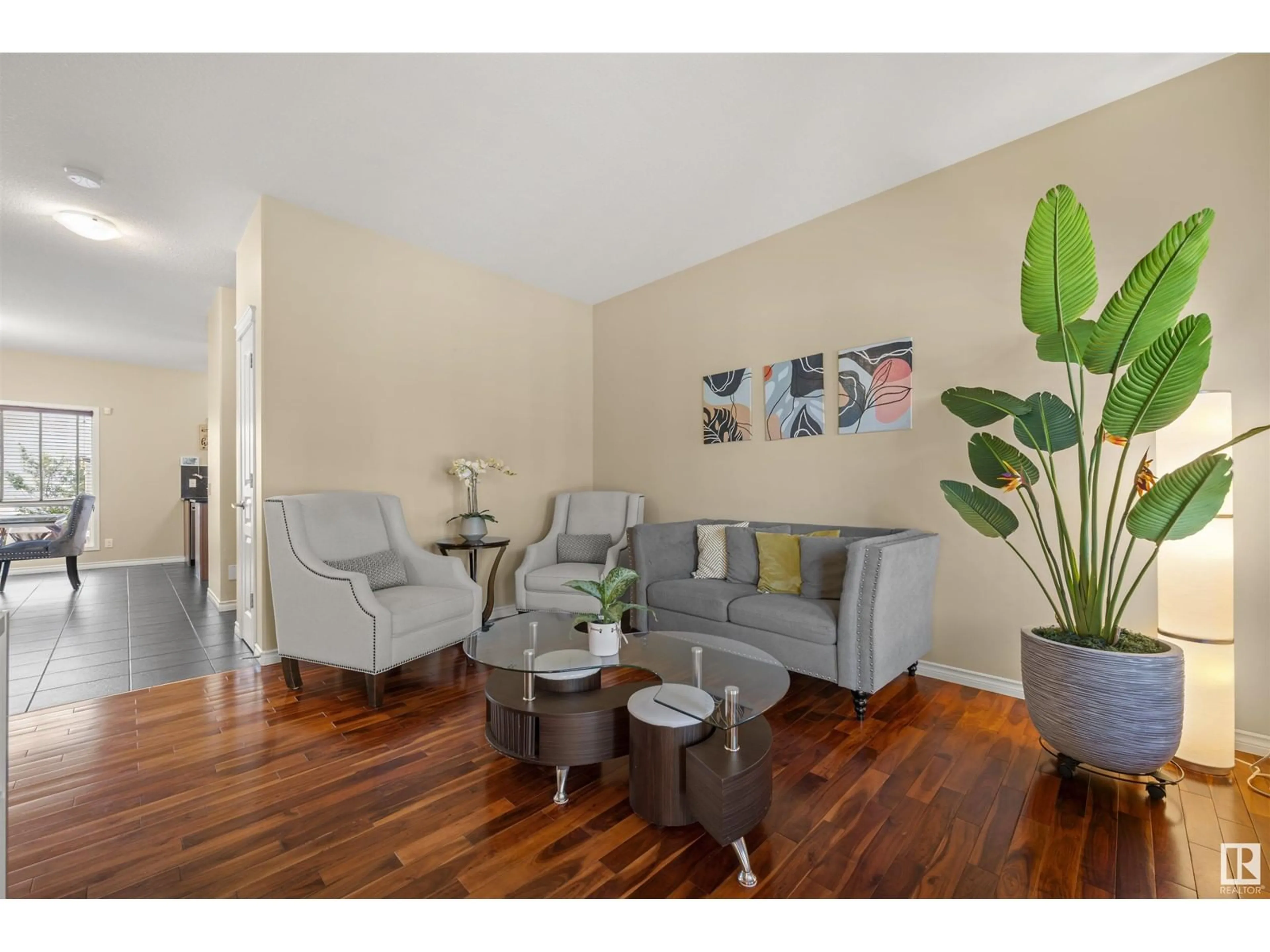 Living room with furniture, wood/laminate floor for 21232 58 AV, Edmonton Alberta T6M0H4