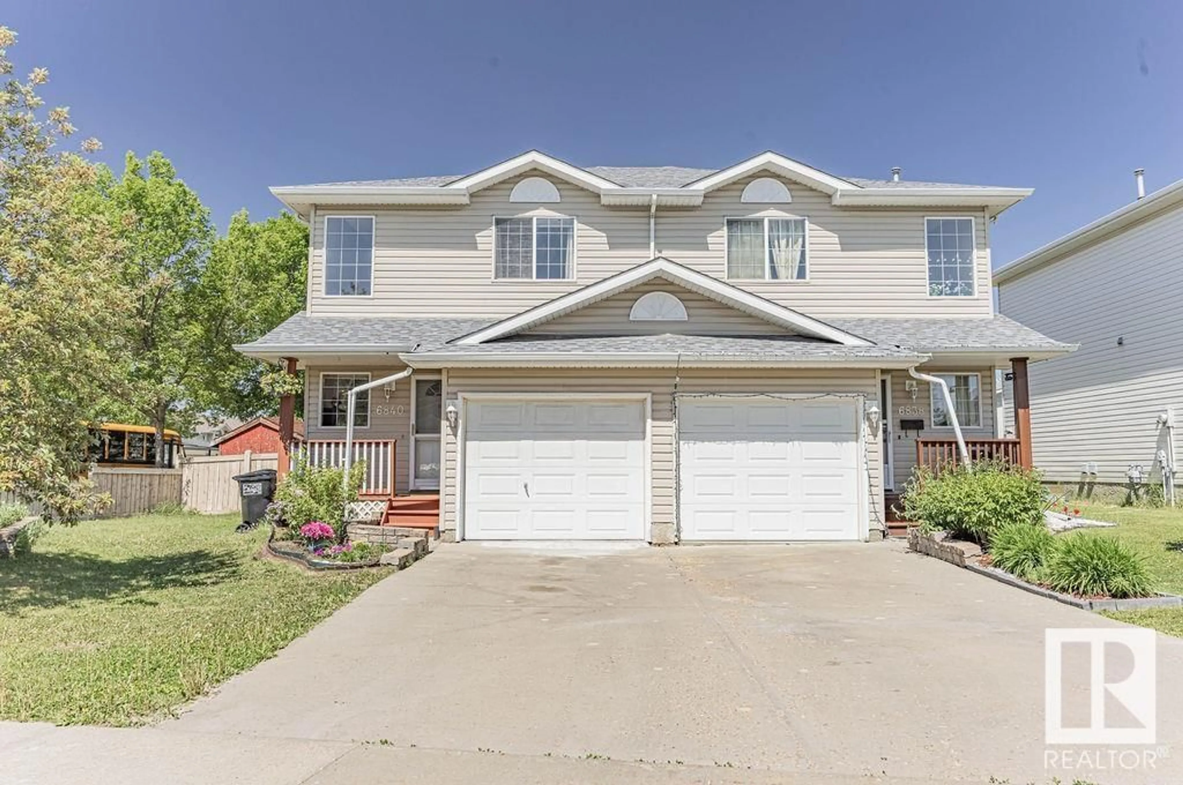 Home with vinyl exterior material, street for 6840 159A AV, Edmonton Alberta T5Z3N9