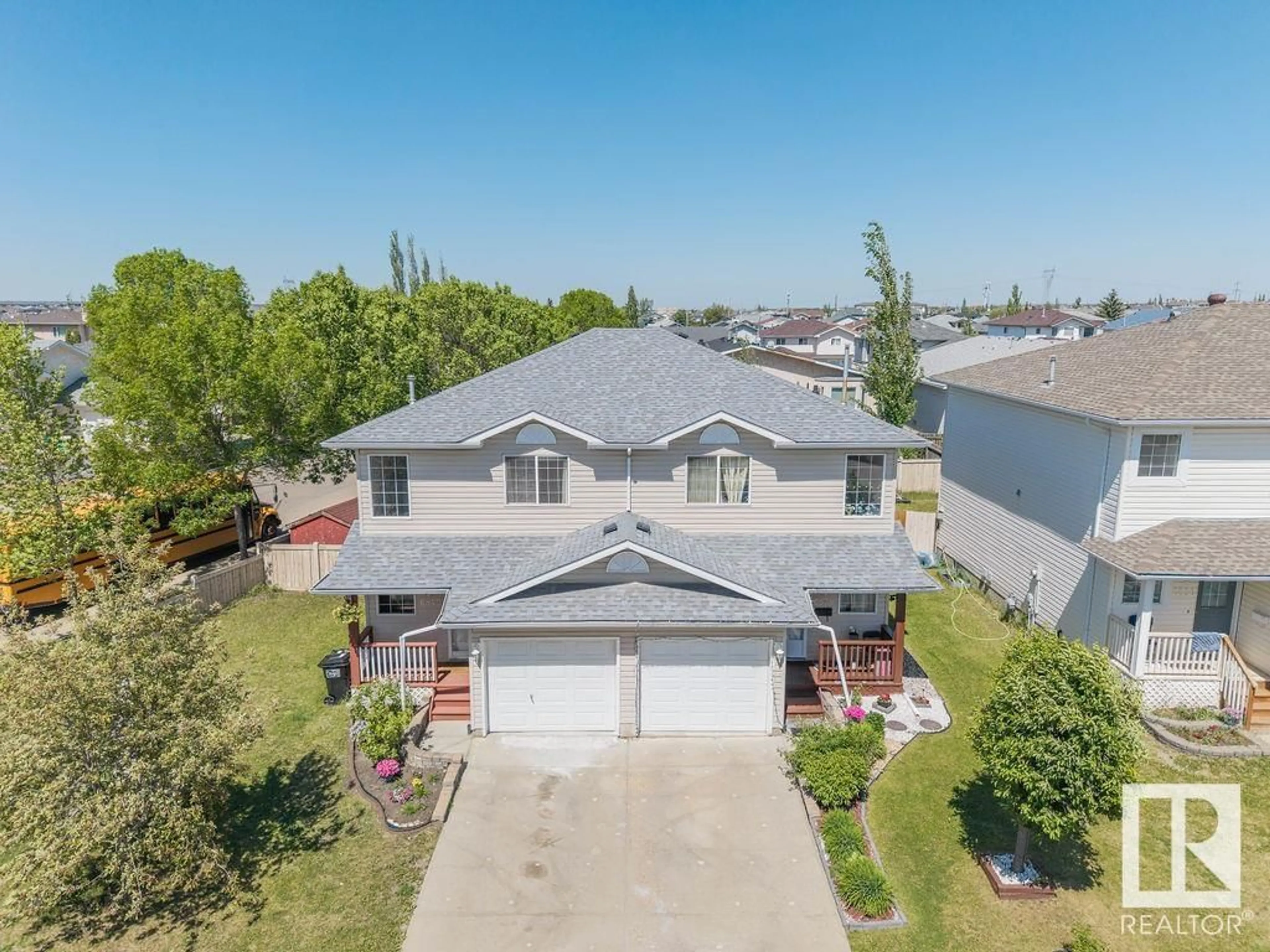 A pic from outside/outdoor area/front of a property/back of a property/a pic from drone, street for 6840 159A AV, Edmonton Alberta T5Z3N9