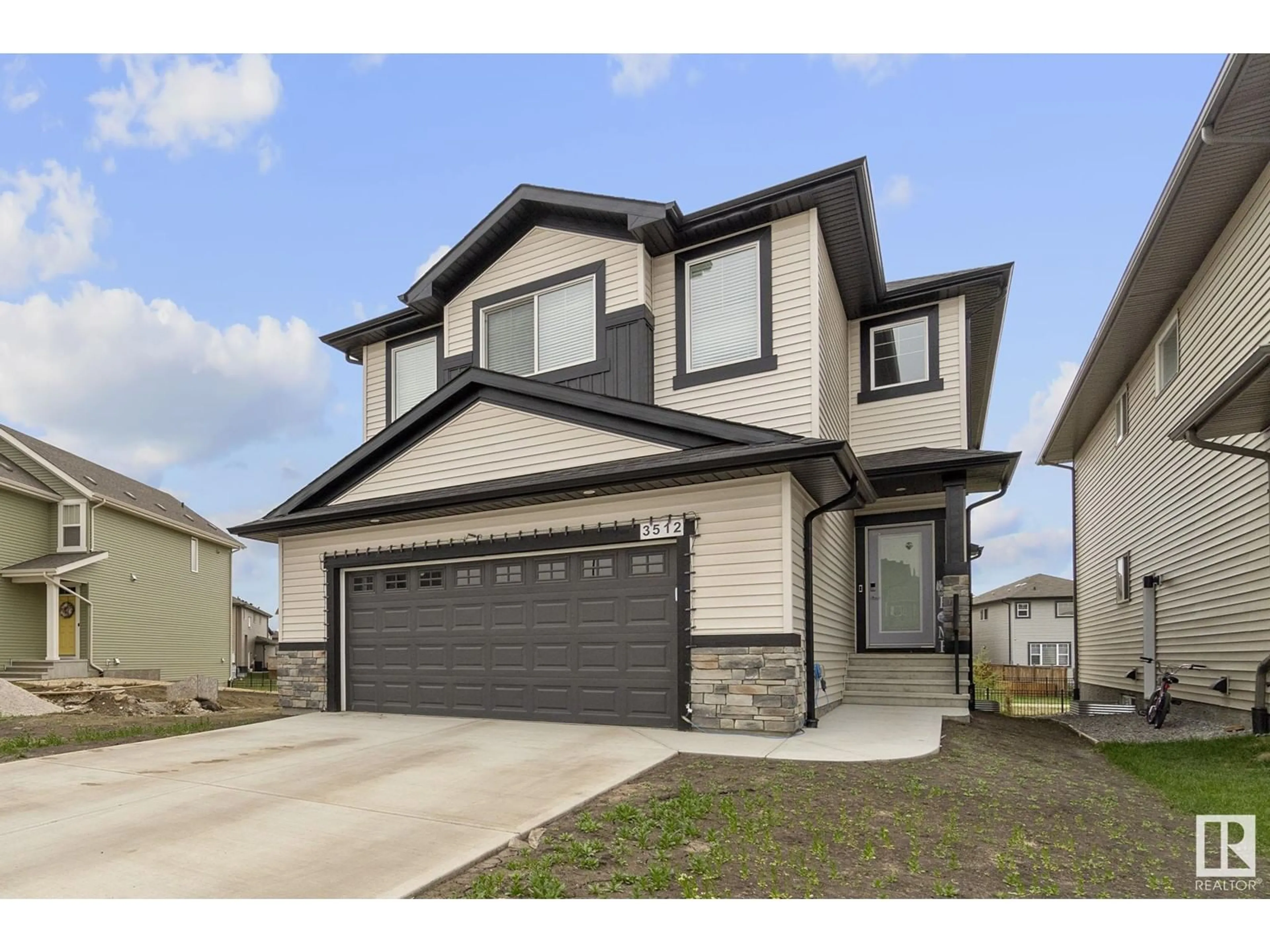 Home with vinyl exterior material, street for NW - 3512 6 ST, Edmonton Alberta T6T2L5