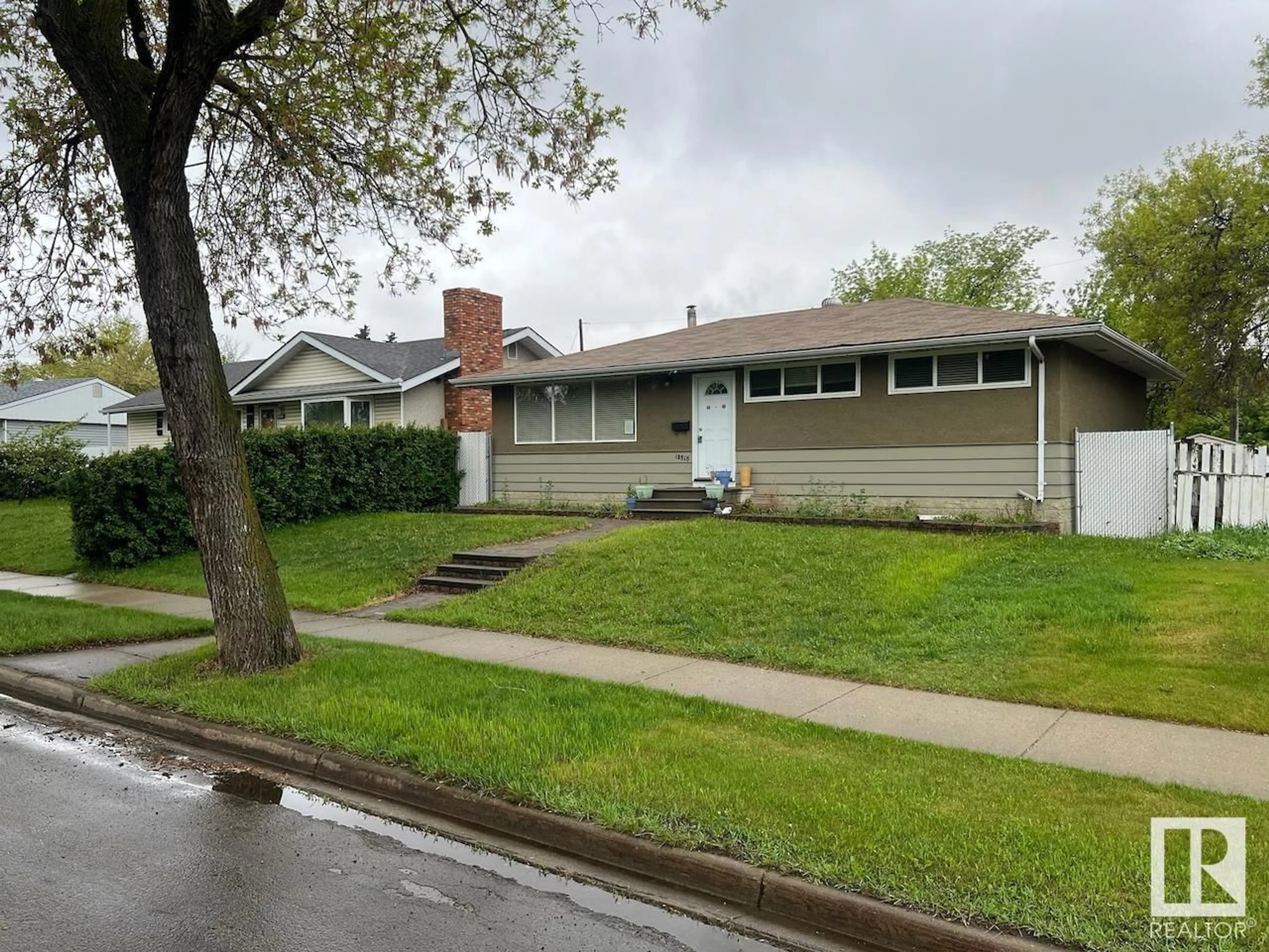 Home with vinyl exterior material, street for NW - 10816 163 ST, Edmonton Alberta T5P3P6