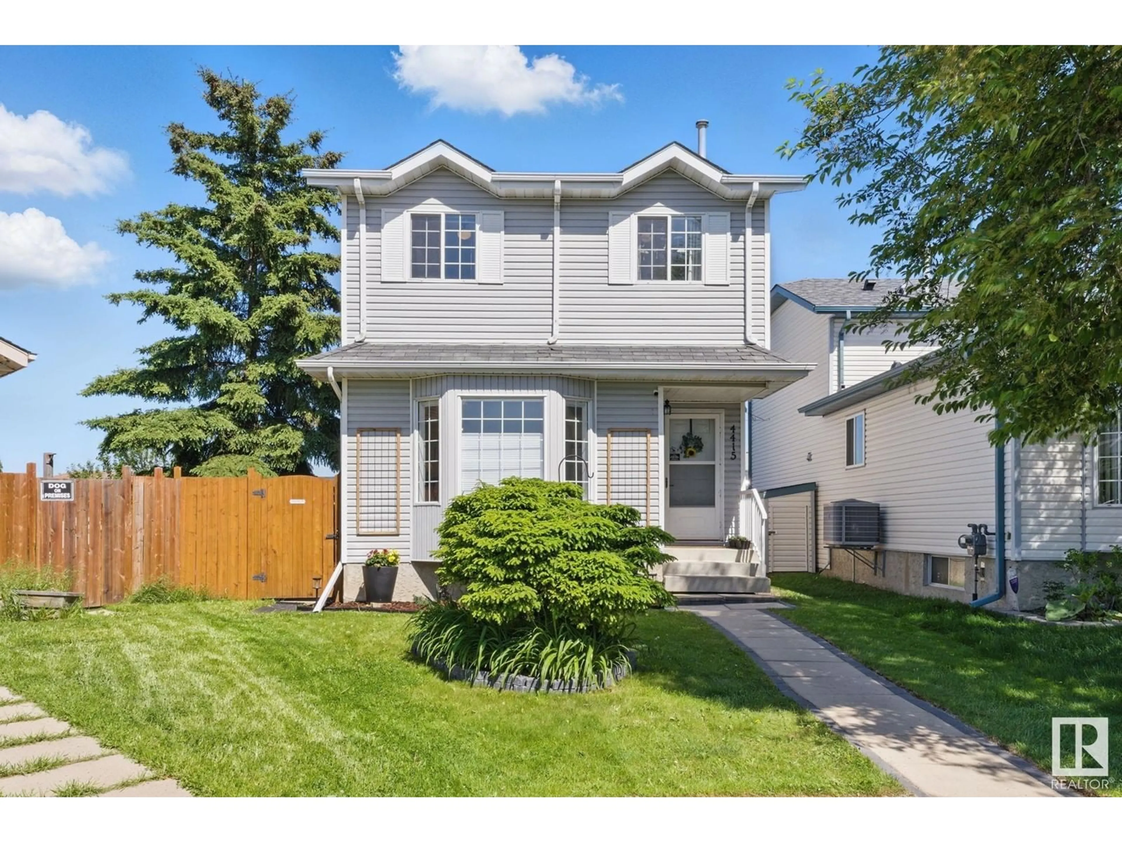 Home with vinyl exterior material, street for 4415 36A ST, Edmonton Alberta T6L6K5