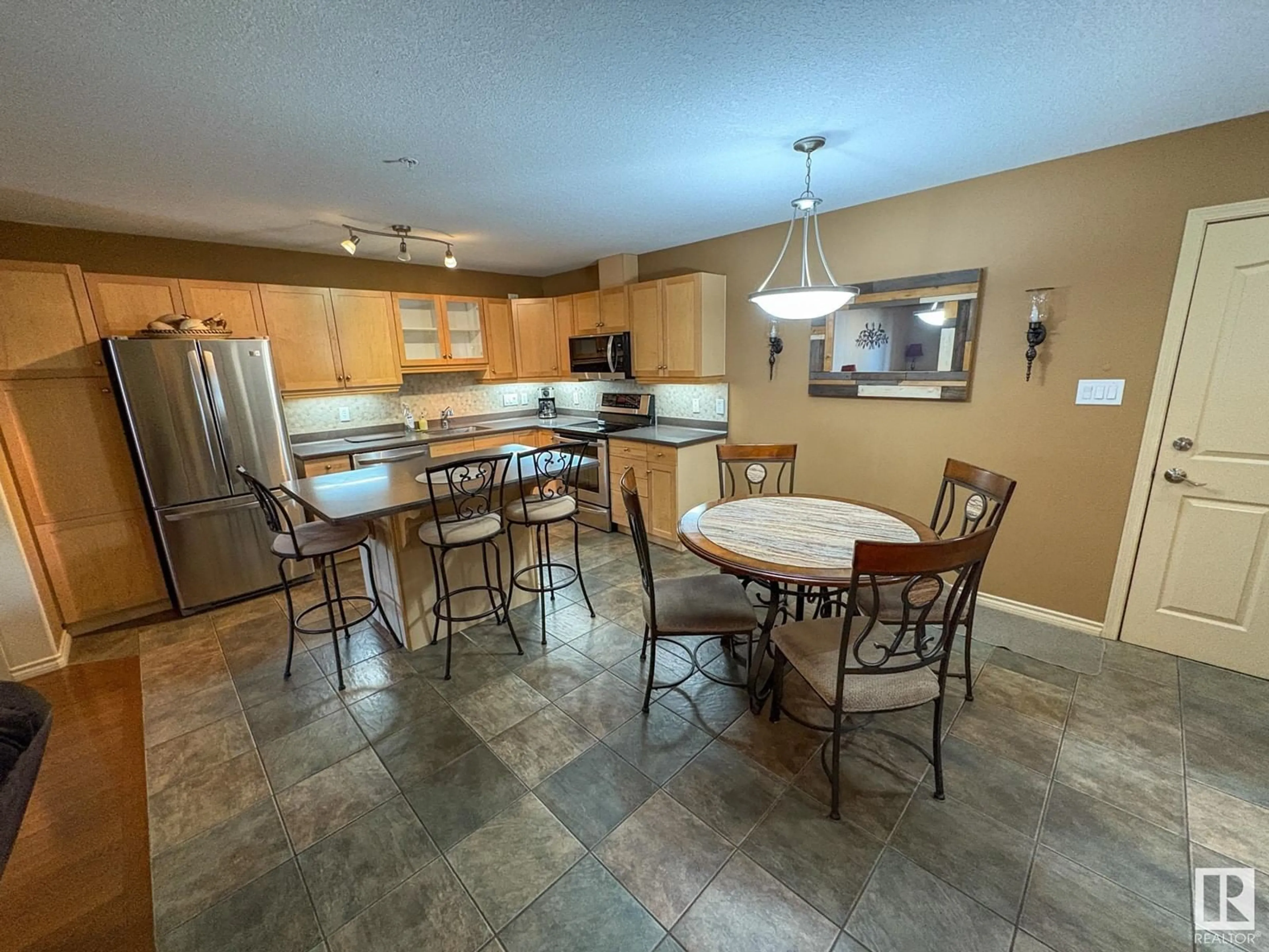Open concept kitchen, ceramic/tile floor for 124 - 124 MCKENNEY AV, St. Albert Alberta T8N7E6