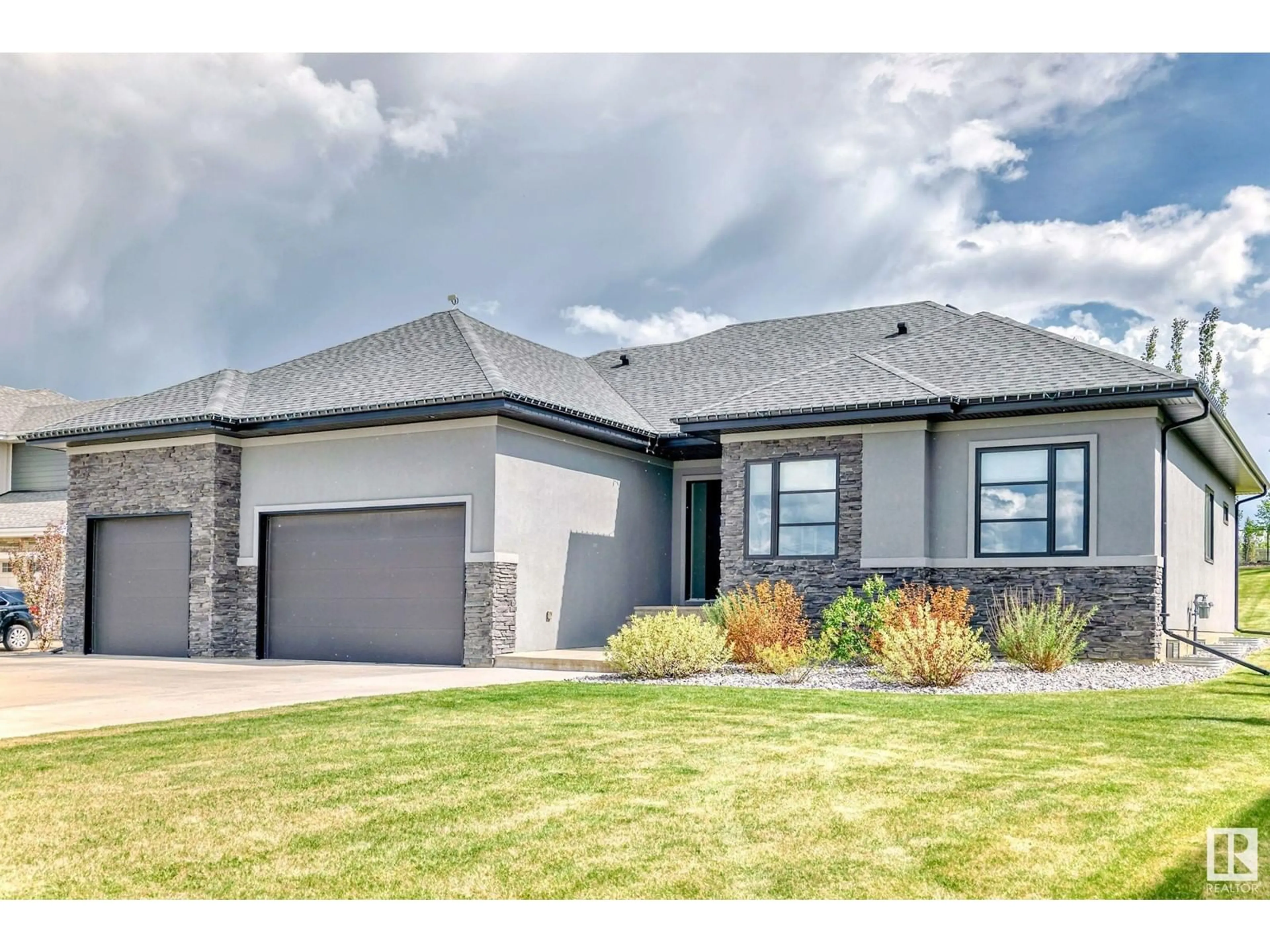 Home with brick exterior material, street for 17 - 26107 TWP RD 532 A, Rural Parkland County Alberta T7Y1A1