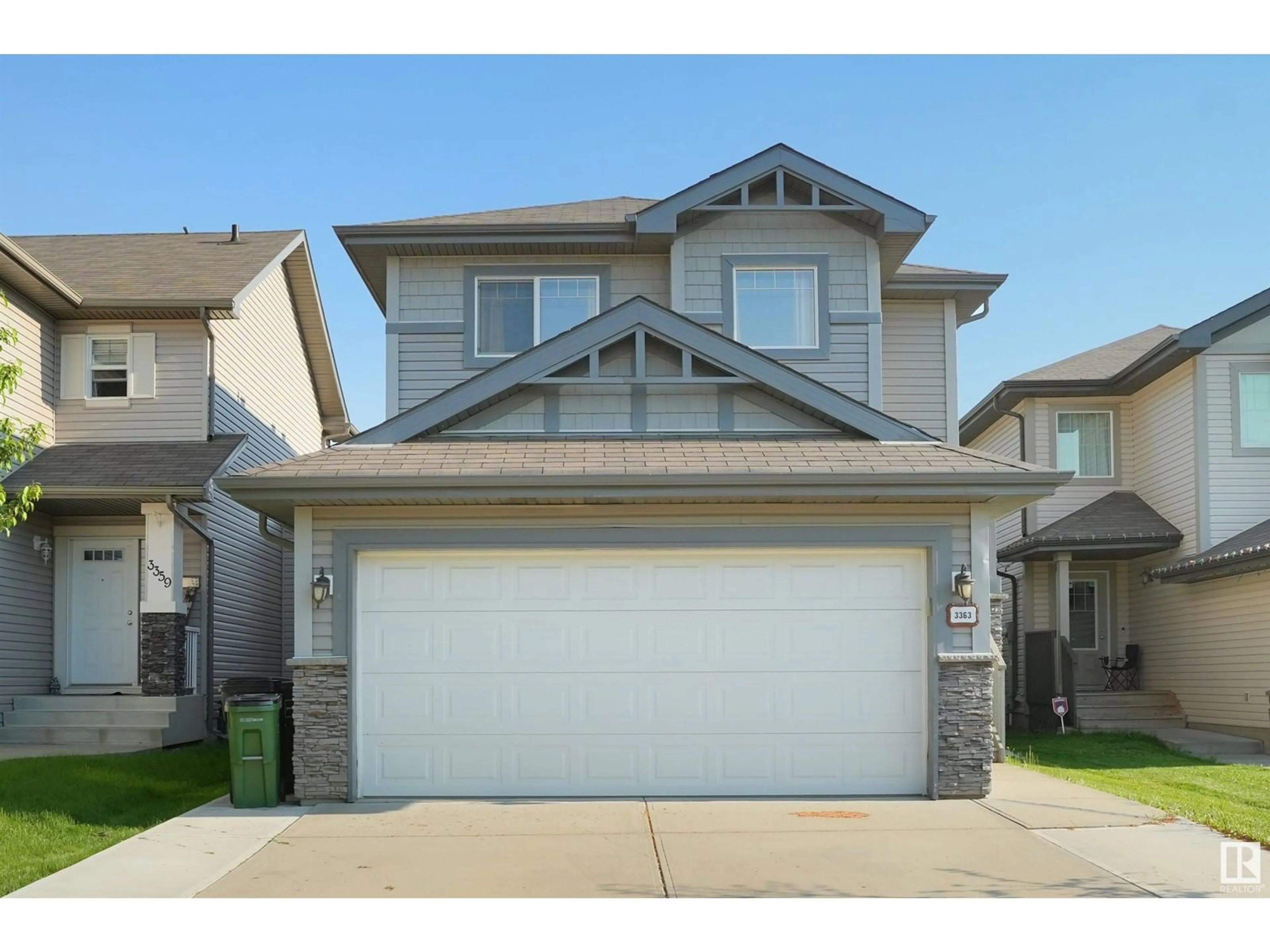 Home with vinyl exterior material, street for 3363 16B AV, Edmonton Alberta T6T0P1
