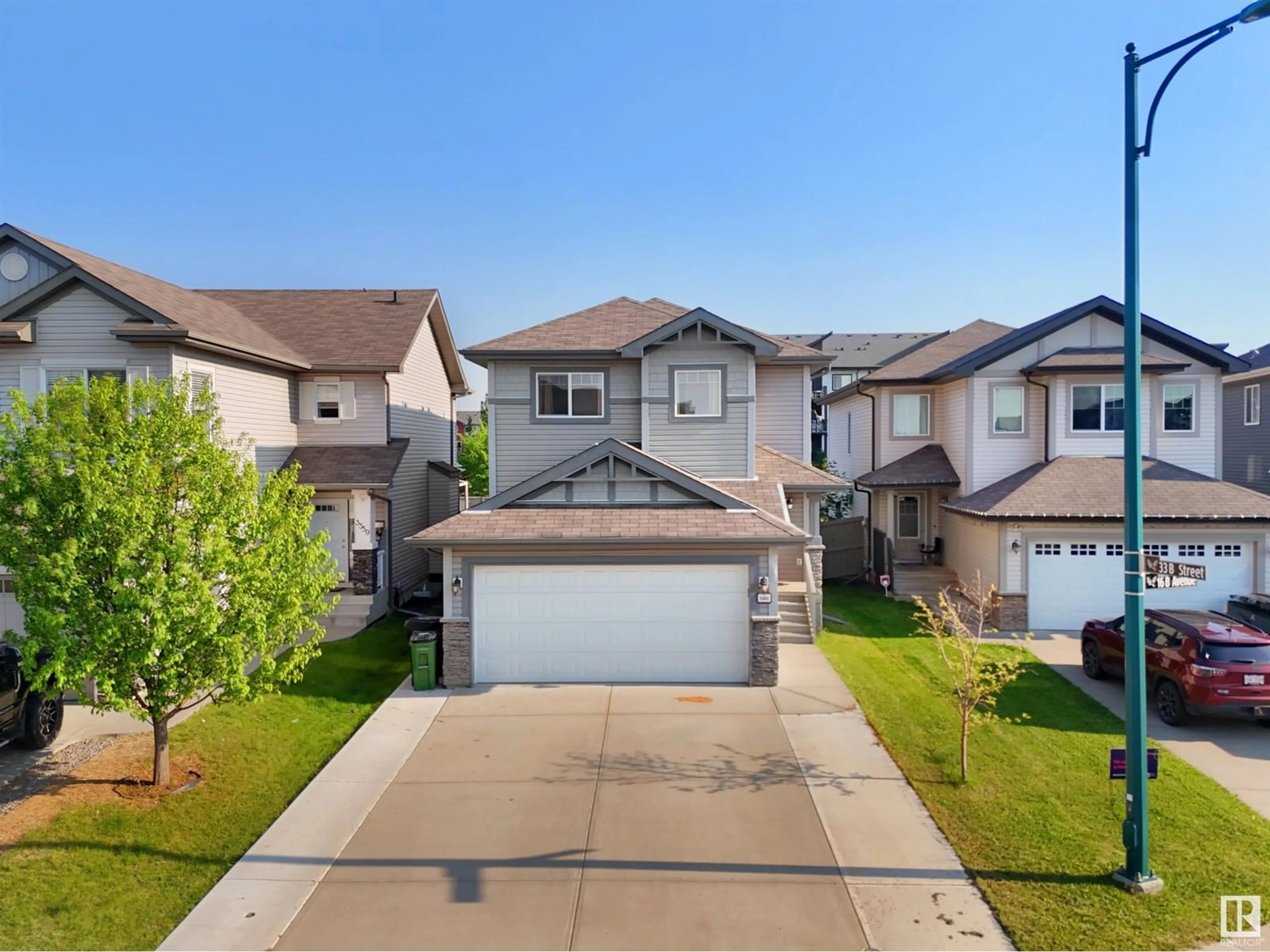 A pic from outside/outdoor area/front of a property/back of a property/a pic from drone, street for 3363 16B AV, Edmonton Alberta T6T0P1