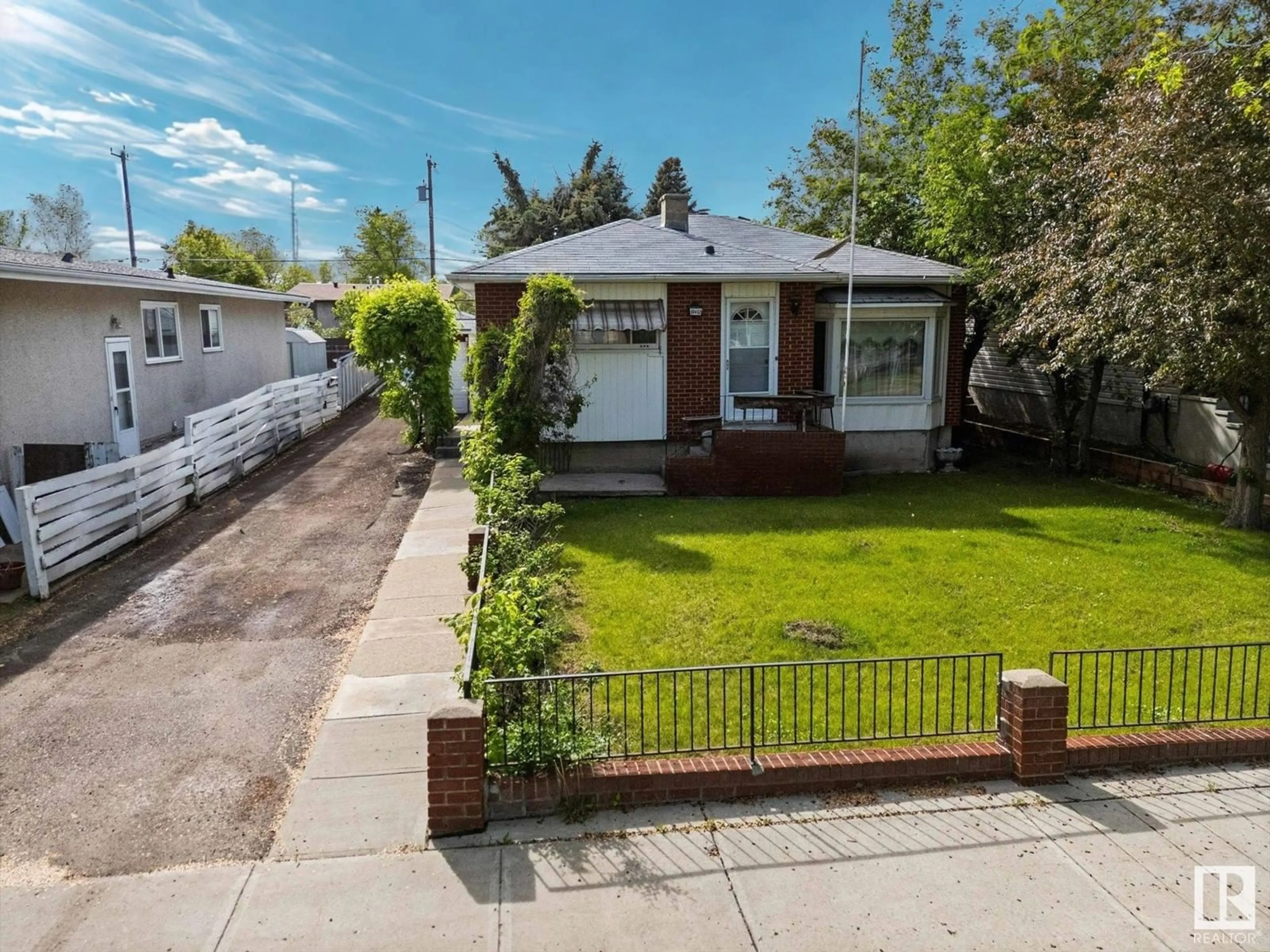 A pic from outside/outdoor area/front of a property/back of a property/a pic from drone, street for 10412 153 ST, Edmonton Alberta T5P2C1
