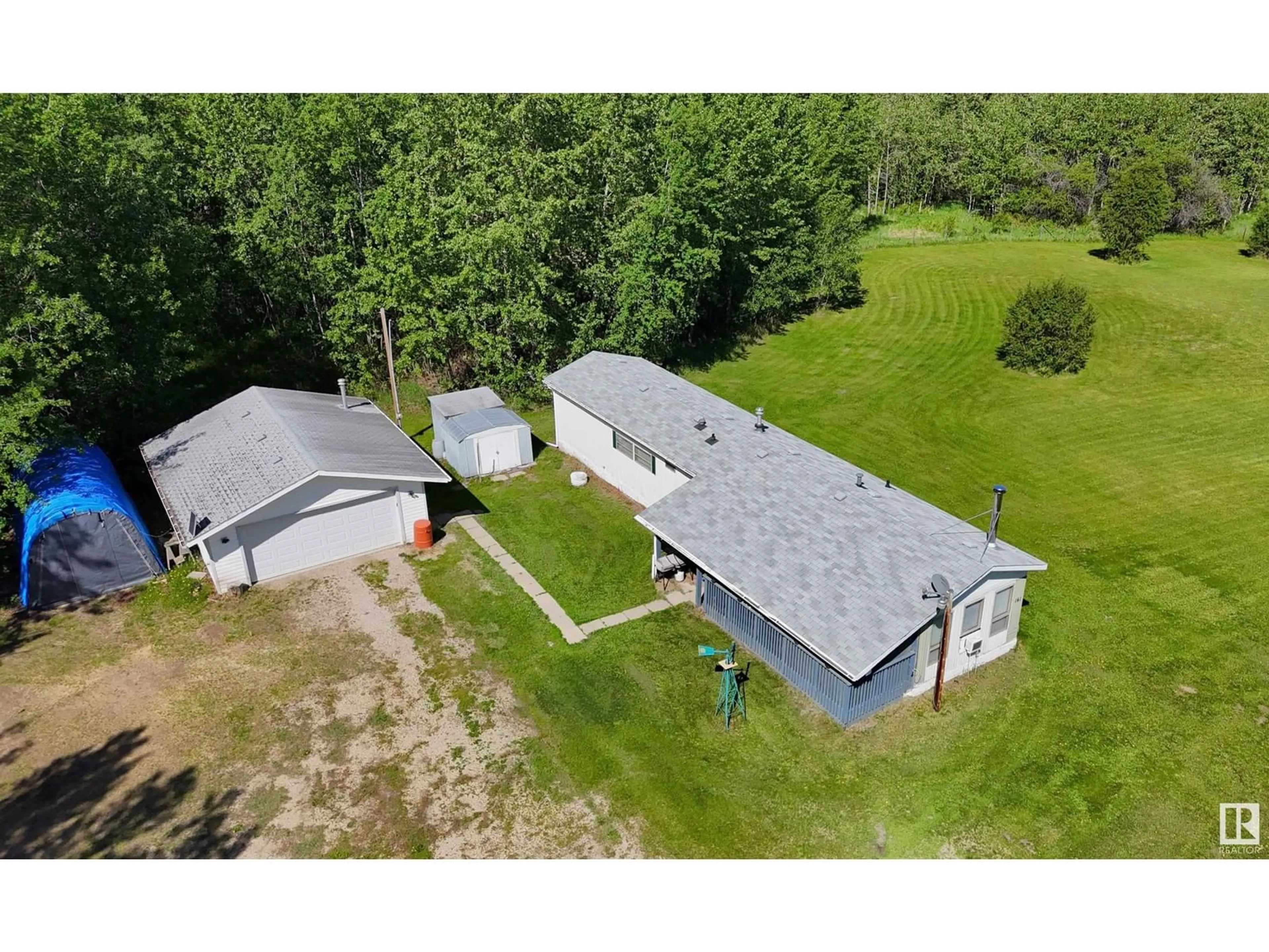 A pic from outside/outdoor area/front of a property/back of a property/a pic from drone, building for 12 54207 RGE ROAD 25, Rural Lac Ste. Anne County Alberta T0E1V0