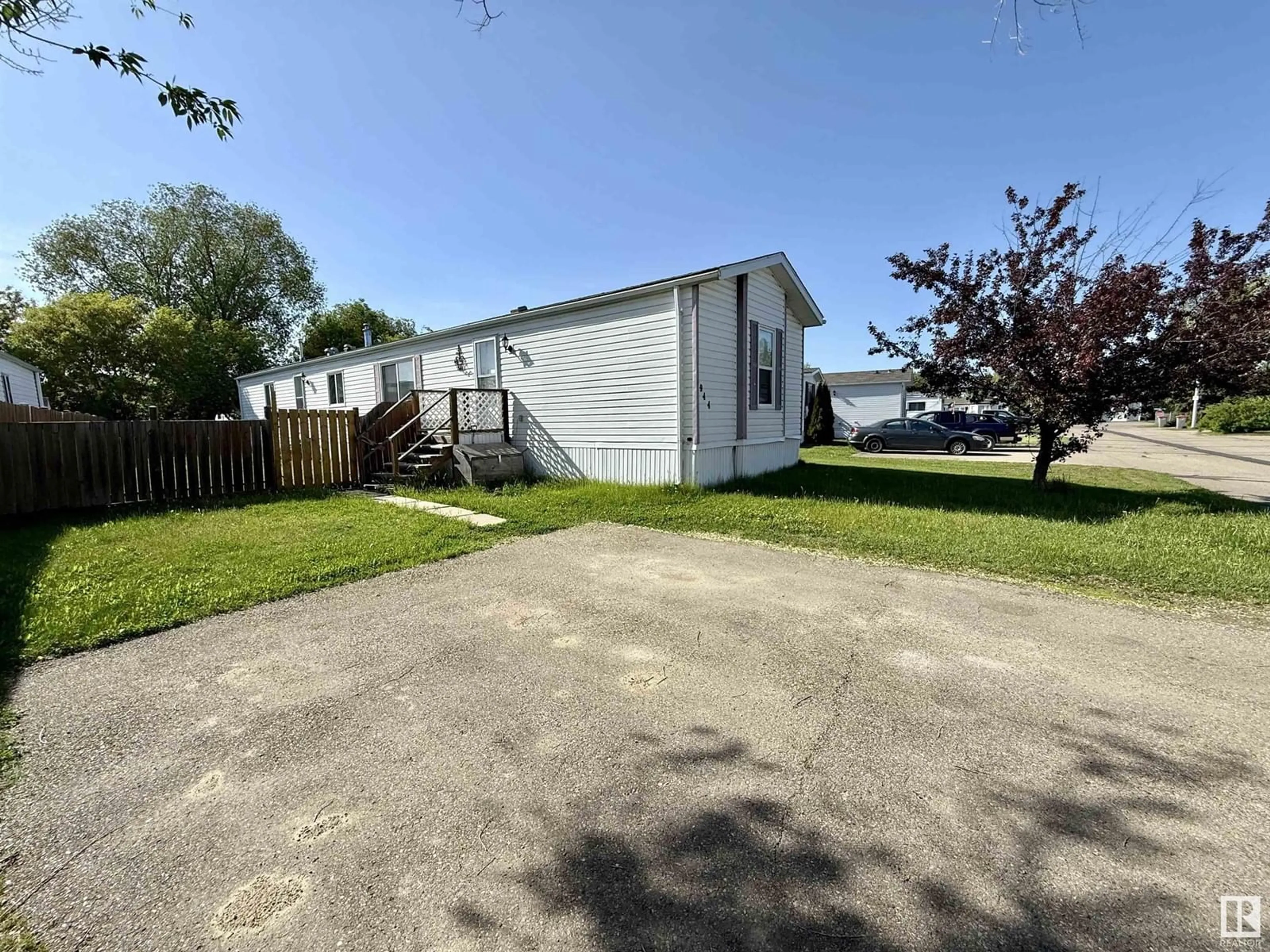 A pic from outside/outdoor area/front of a property/back of a property/a pic from drone, water/lake/river/ocean view for 272 - 944 53222 RR, Rural Parkland County Alberta T7Y3N8