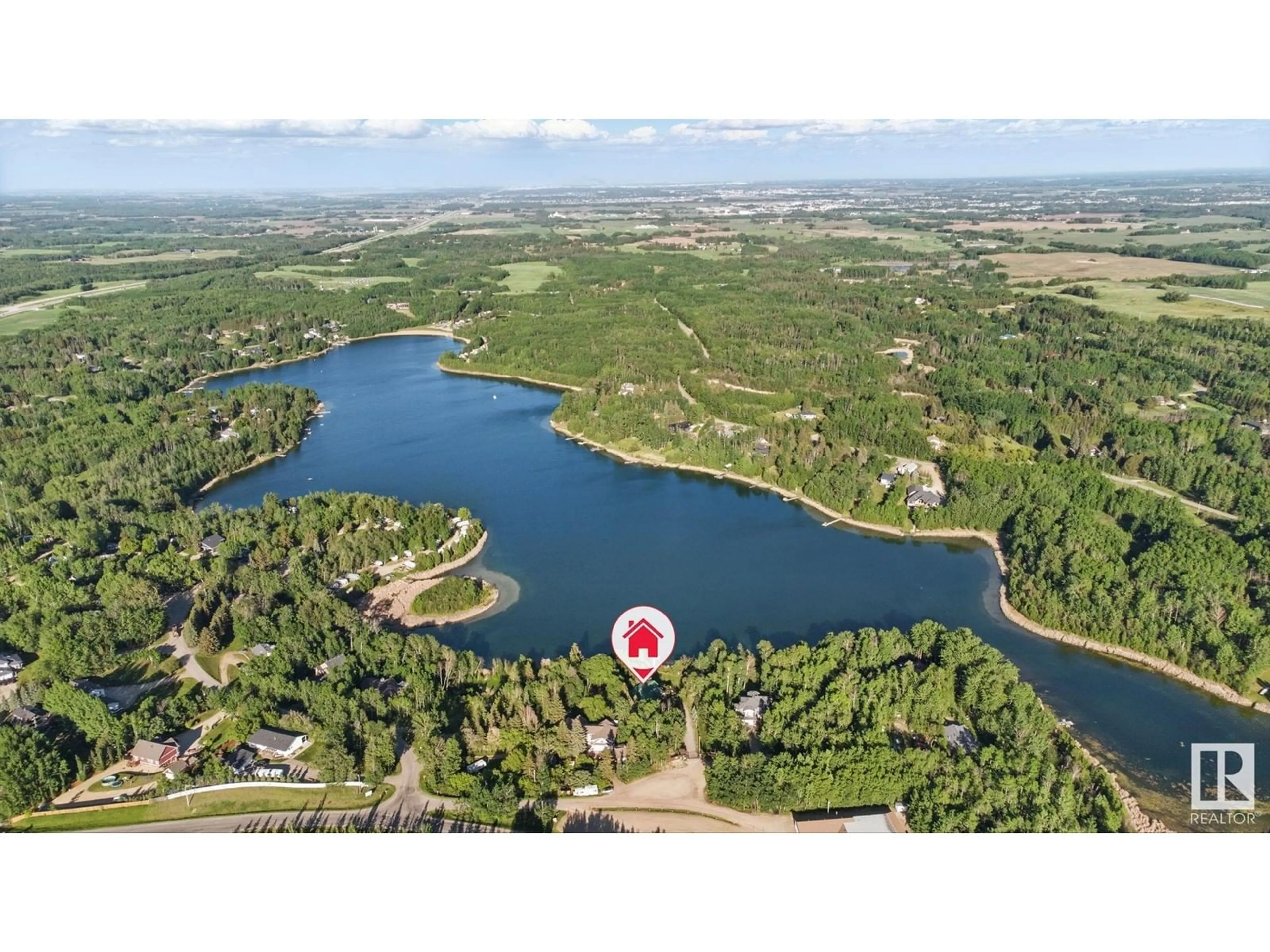 A pic from outside/outdoor area/front of a property/back of a property/a pic from drone, water/lake/river/ocean view for 27 - 53117 RGE ROAD 14, Rural Parkland County Alberta T7Y2T3