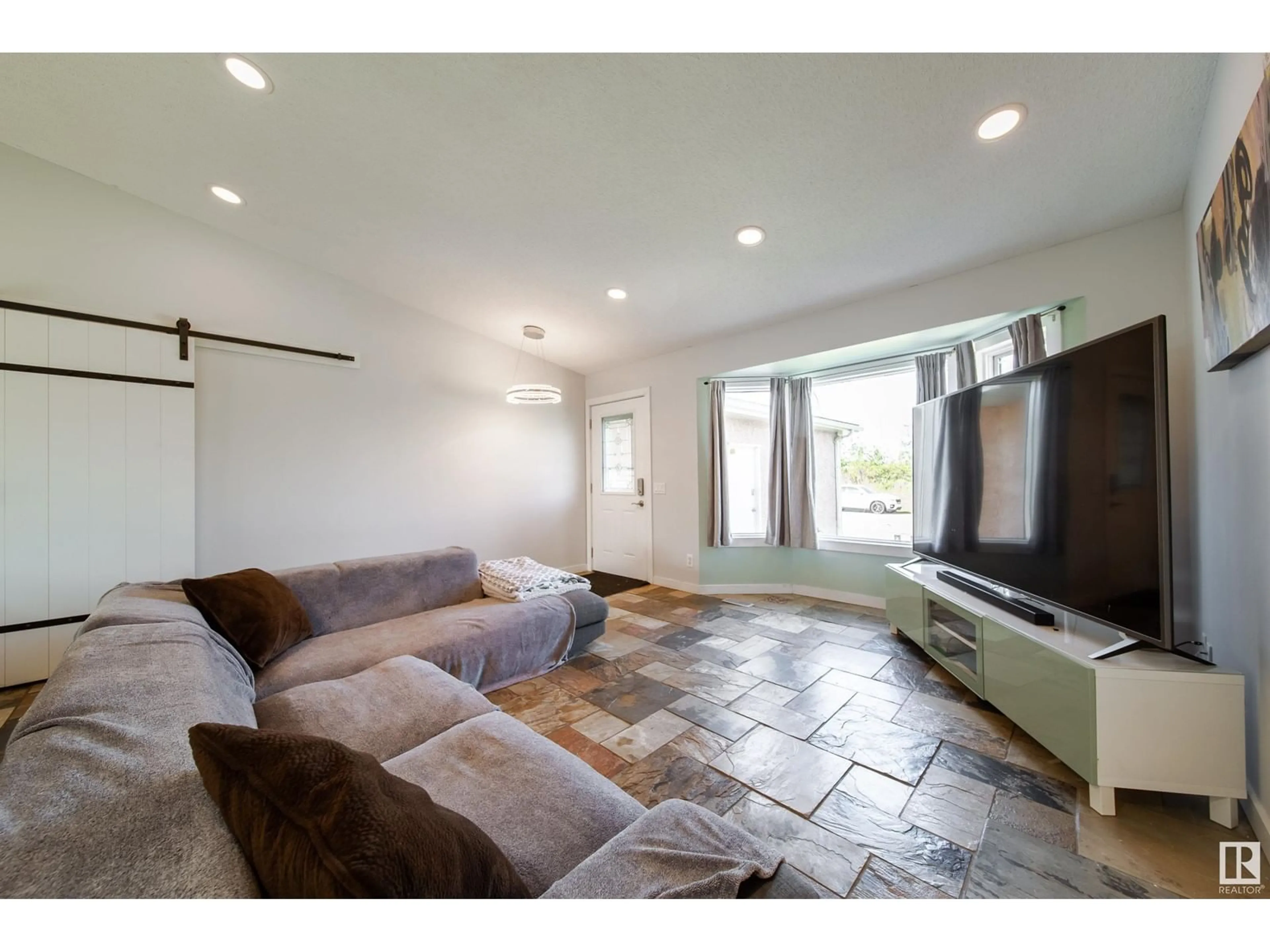Living room with furniture, unknown for NW - 7415 190A ST, Edmonton Alberta T5T5T2