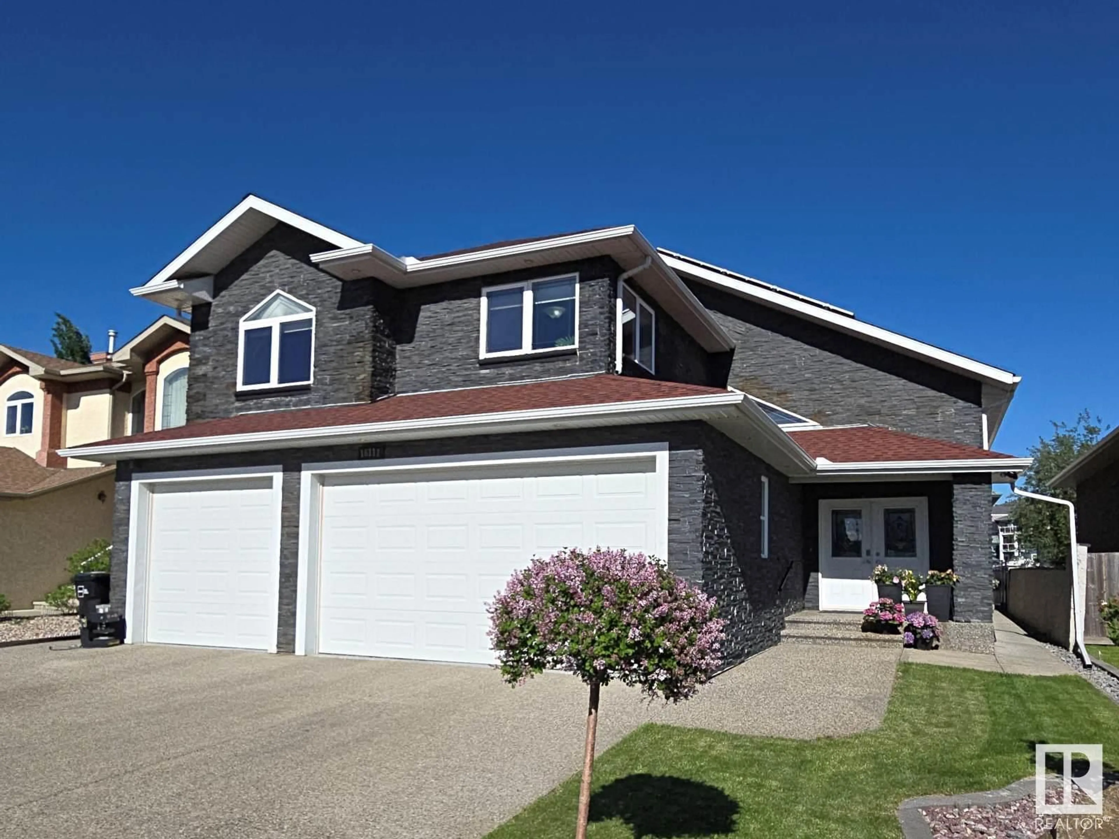 Home with vinyl exterior material, street for NW - 16111 134 ST, Edmonton Alberta T6V0C1
