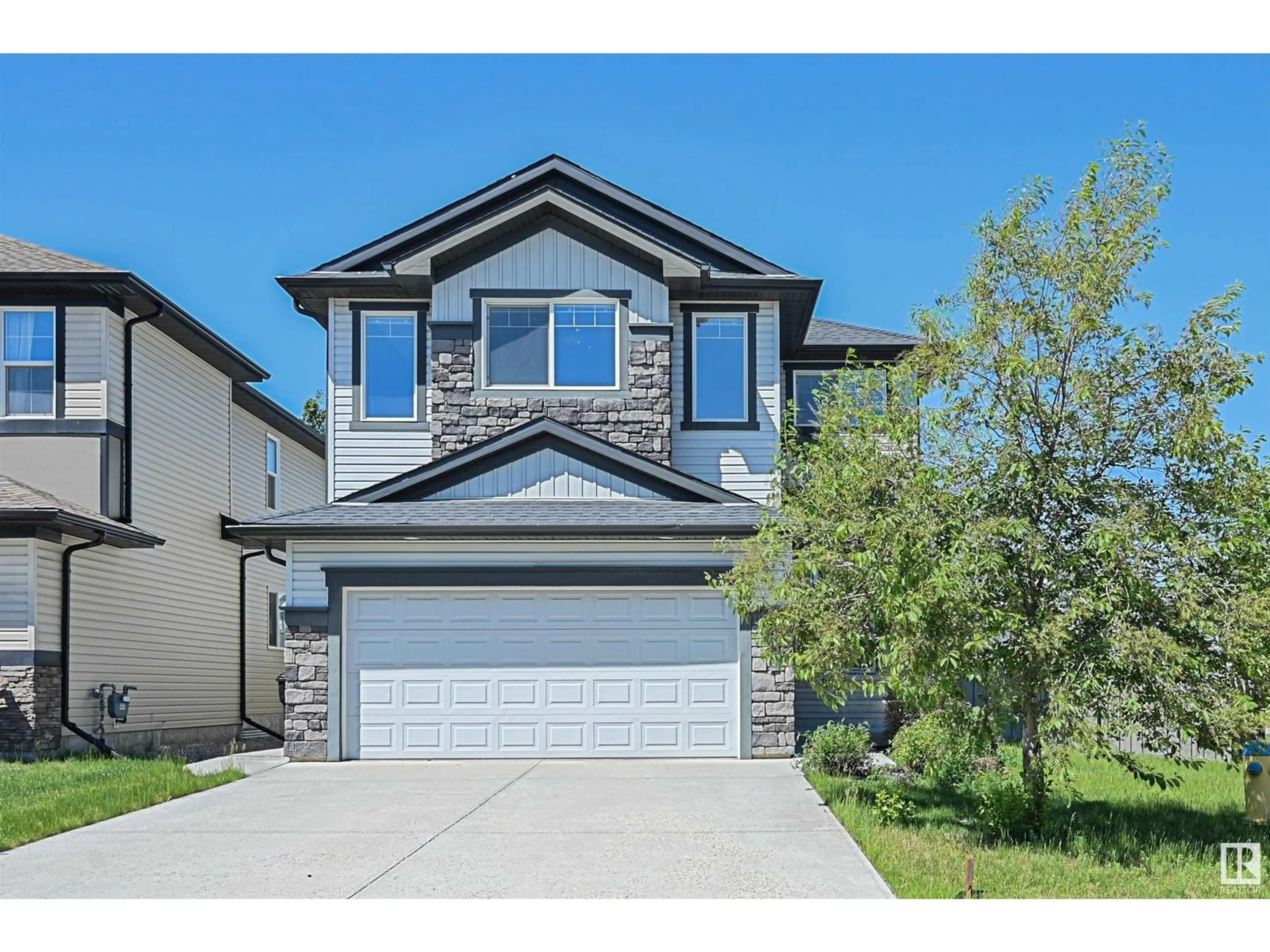 Home with vinyl exterior material, street for 3520 CLAXTON CR, Edmonton Alberta T6W0Z6