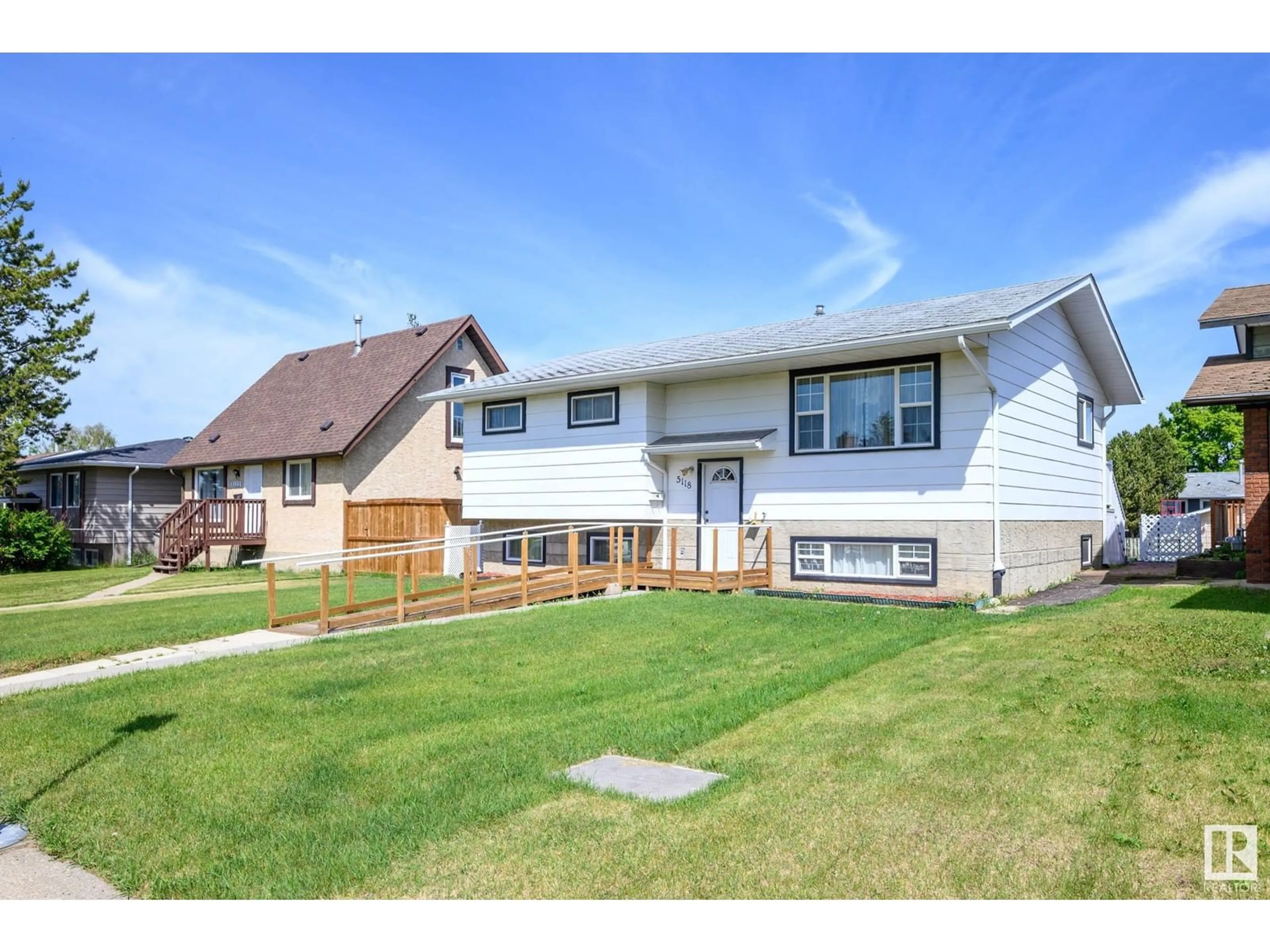 Home with vinyl exterior material, street for 5118 17A AV, Edmonton Alberta T6L1A6