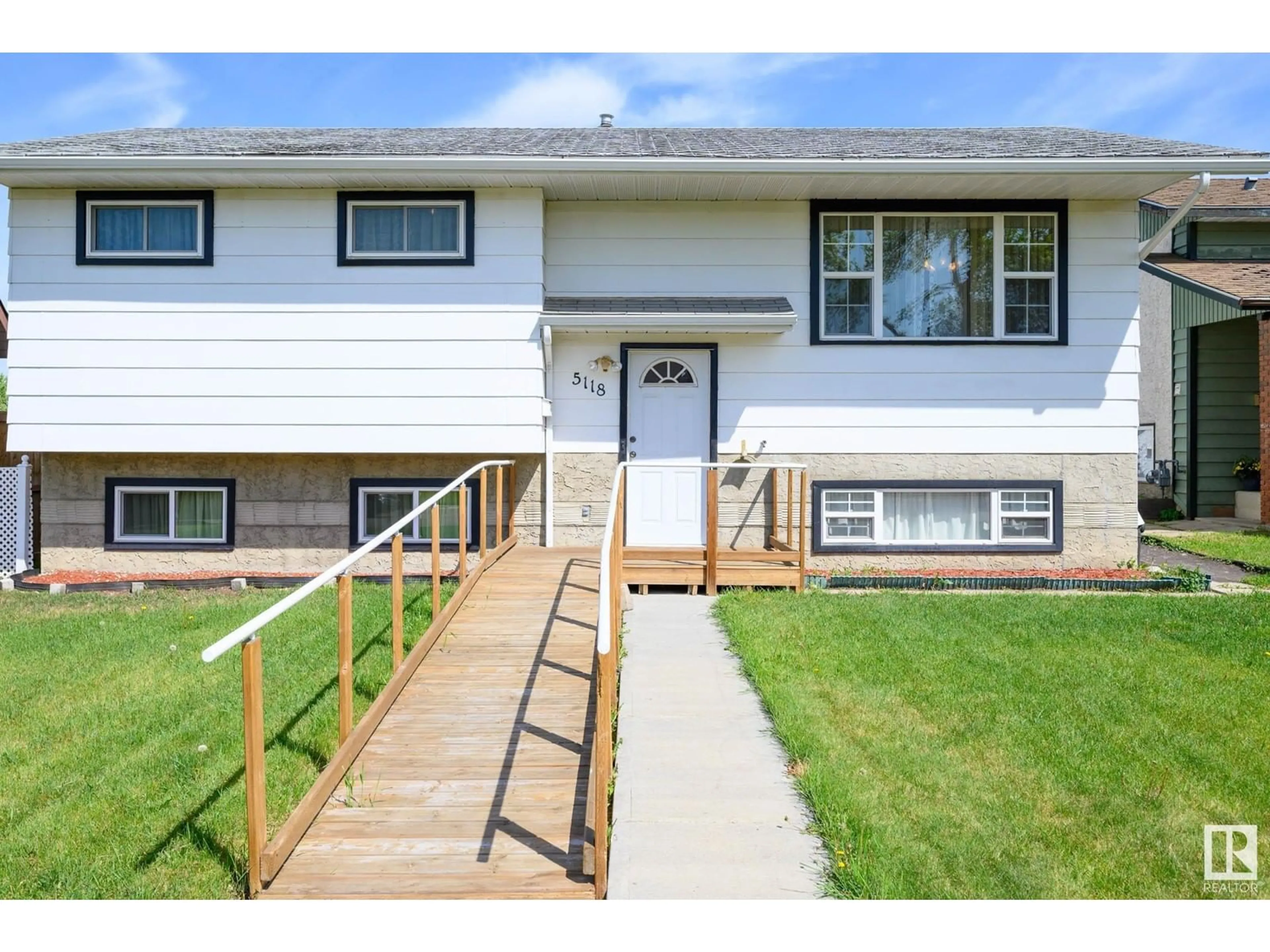 Home with vinyl exterior material, street for 5118 17A AV, Edmonton Alberta T6L1A6