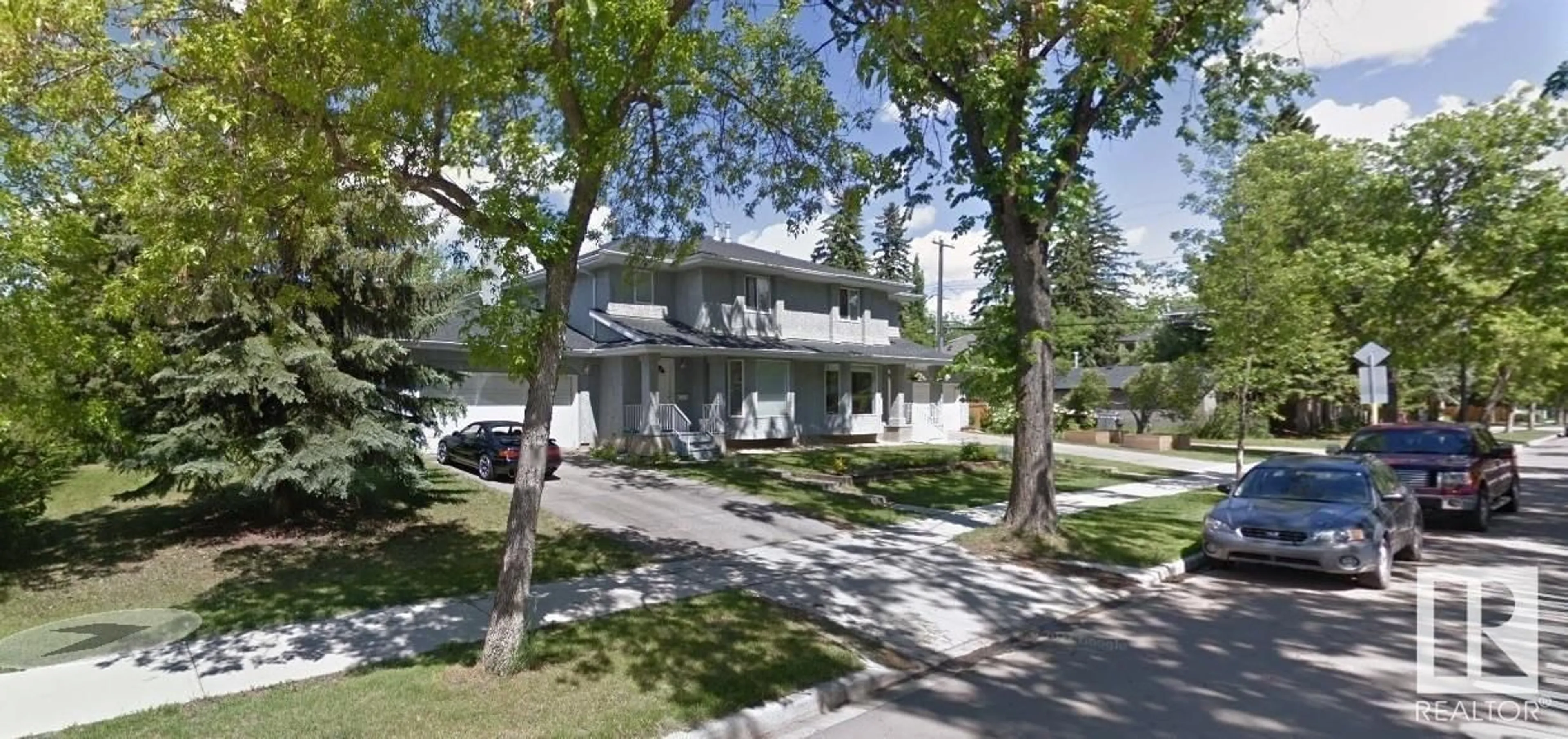 Home with vinyl exterior material, street for NW - 12620 109 AV, Edmonton Alberta T5M4C2