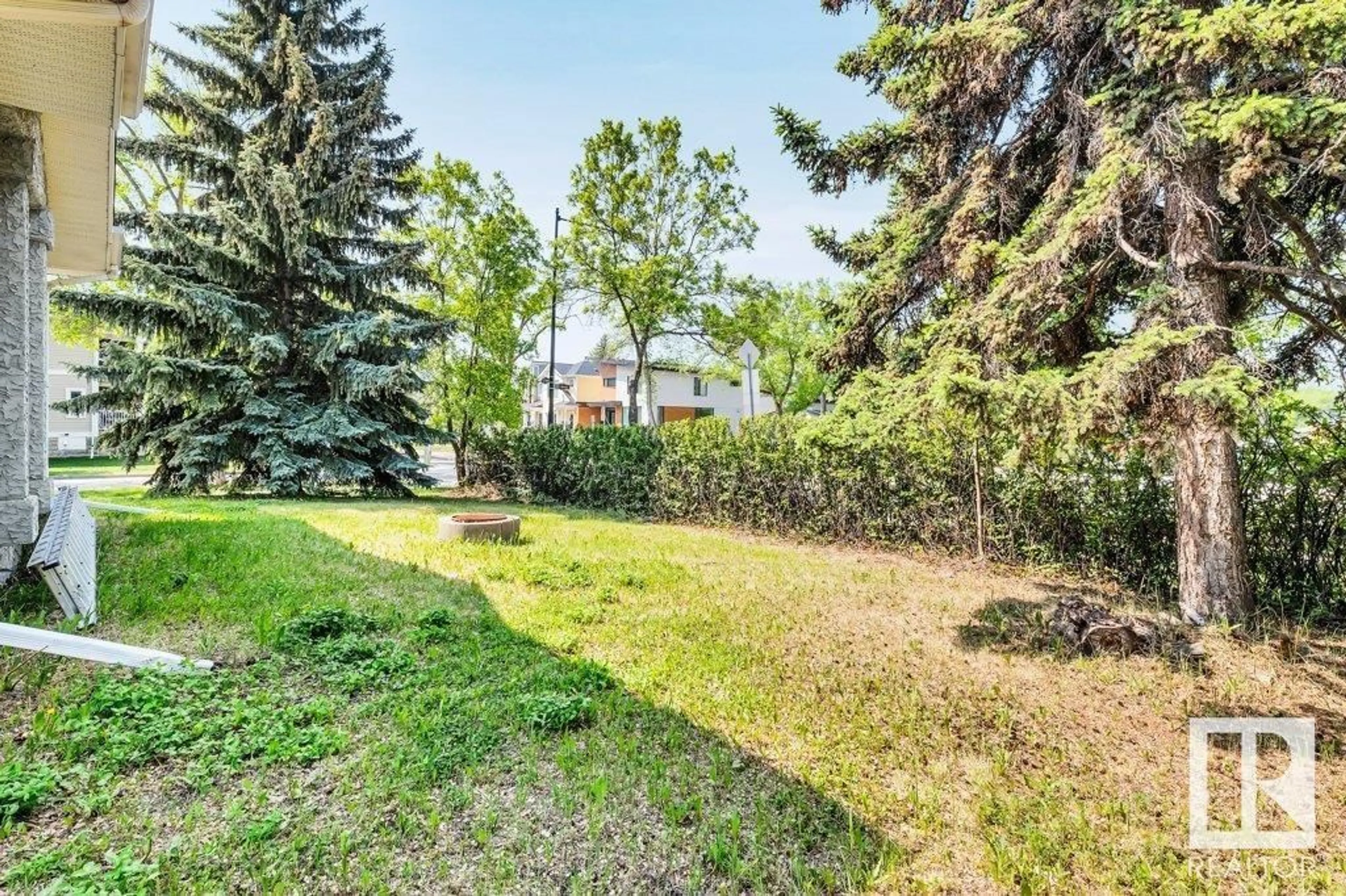 Patio, forest/trees view for NW - 12620 109 AV, Edmonton Alberta T5M4C2