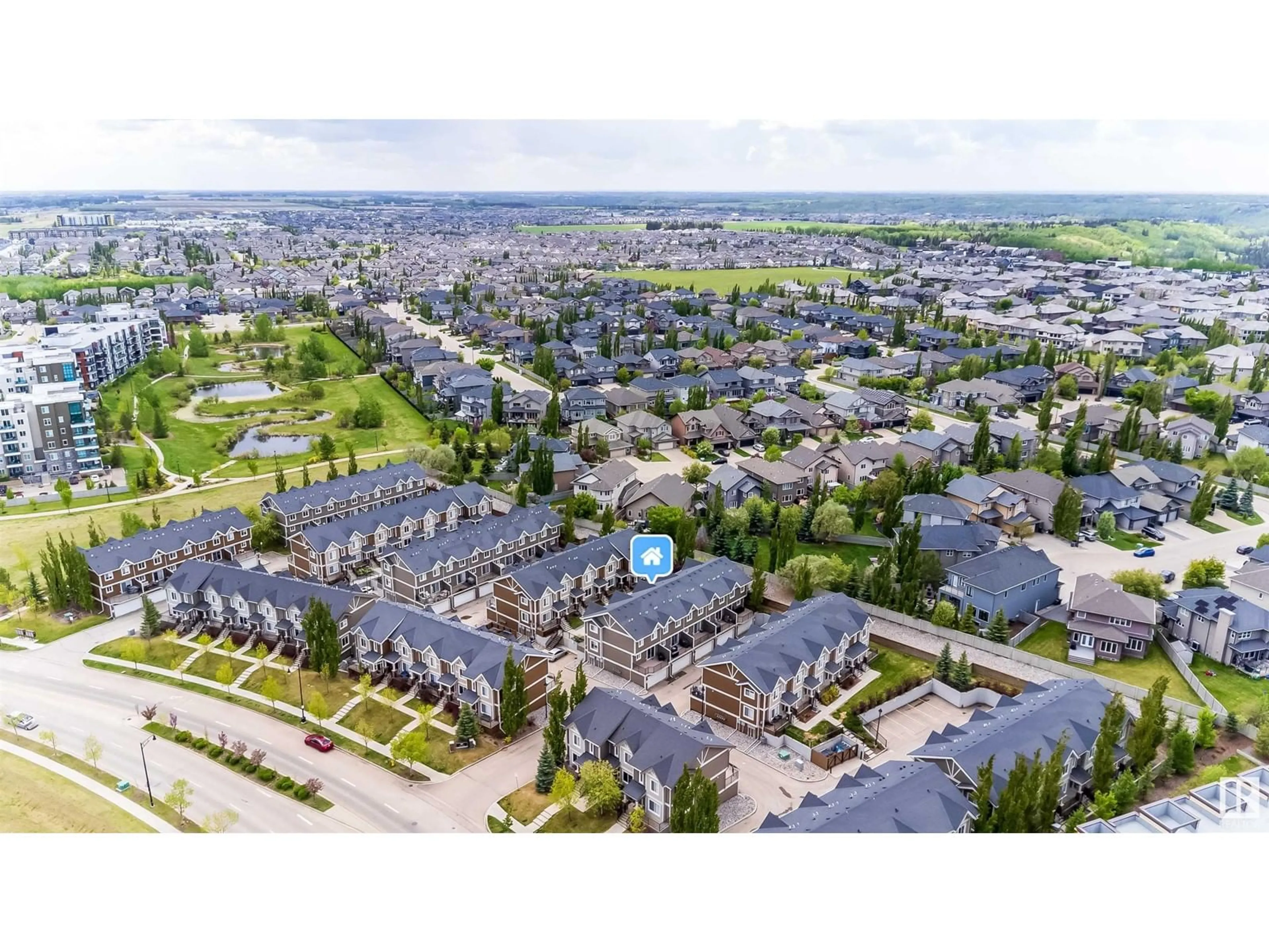 A pic from outside/outdoor area/front of a property/back of a property/a pic from drone, street for #20 - 1150 WINDERMERE WY, Edmonton Alberta T6W2B6